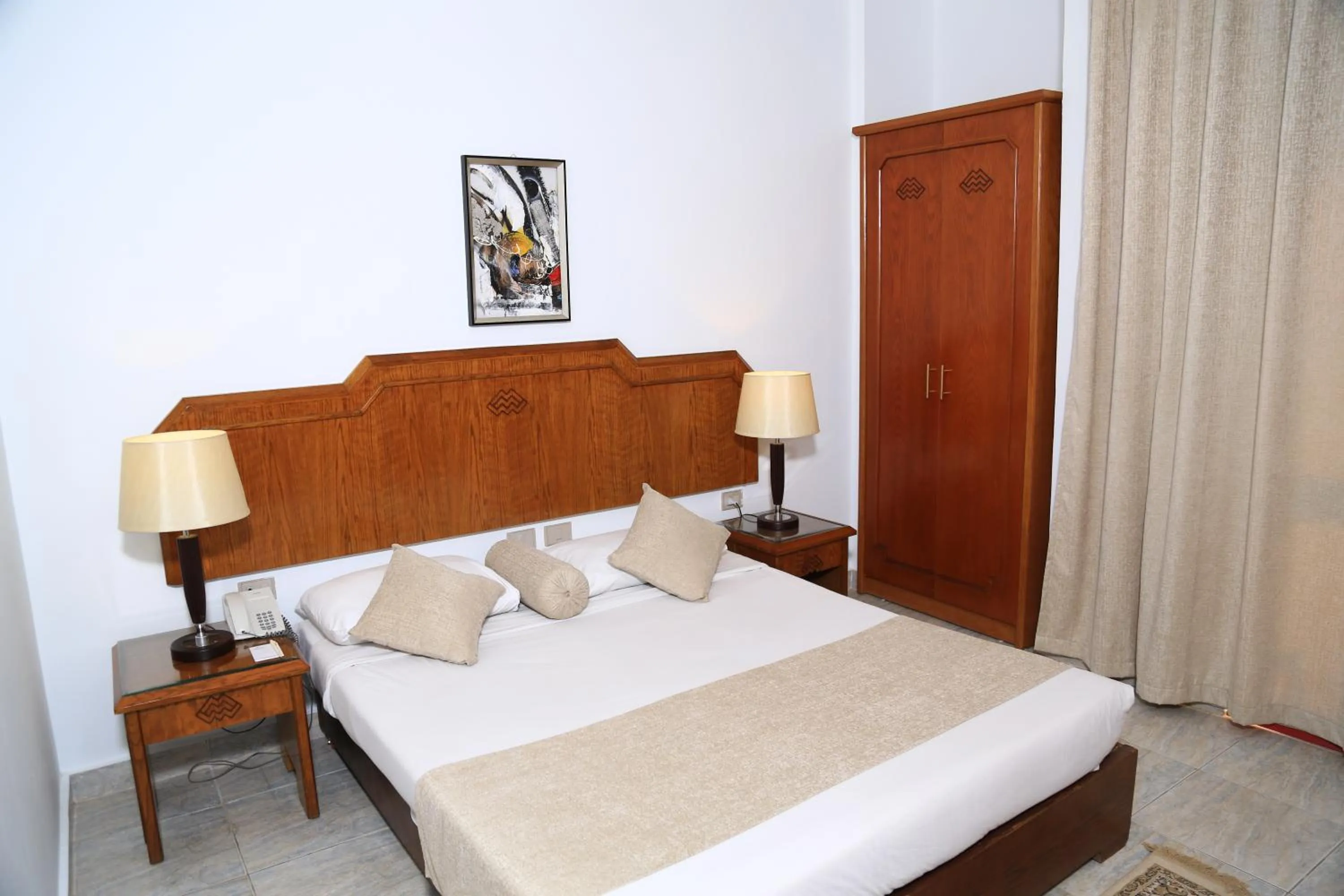 Bed in MinaMark Beach Resort for Families and Couples Only