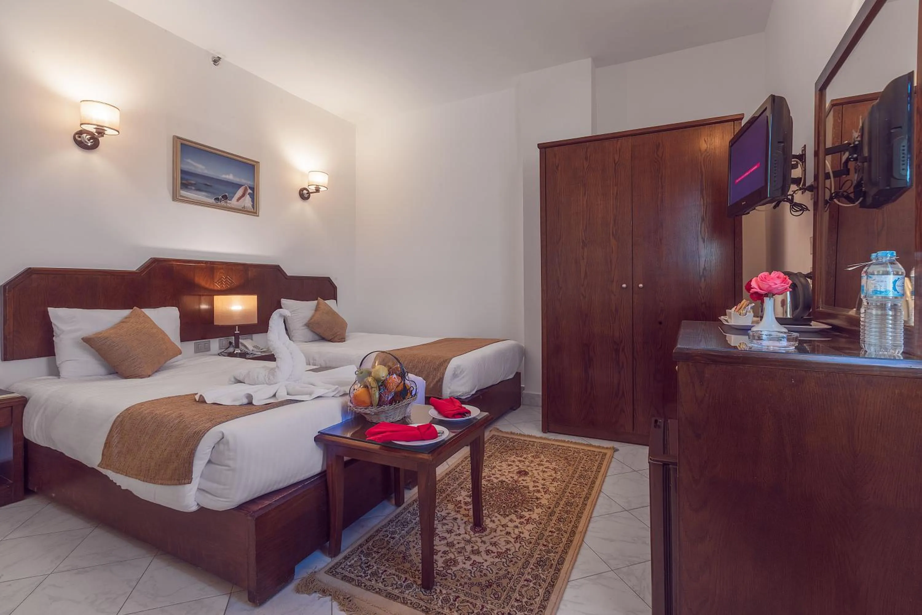 Coffee/tea facilities, Bed in MinaMark Beach Resort for Families and Couples Only