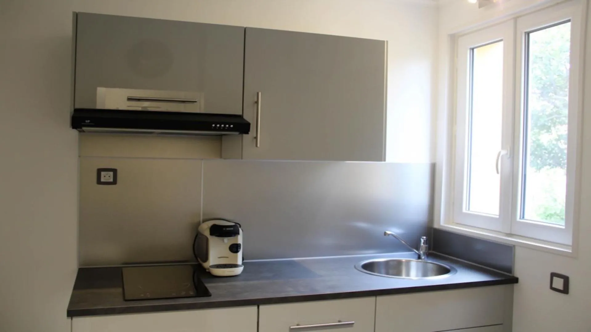 Kitchen or kitchenette in Résidence les Caraibes