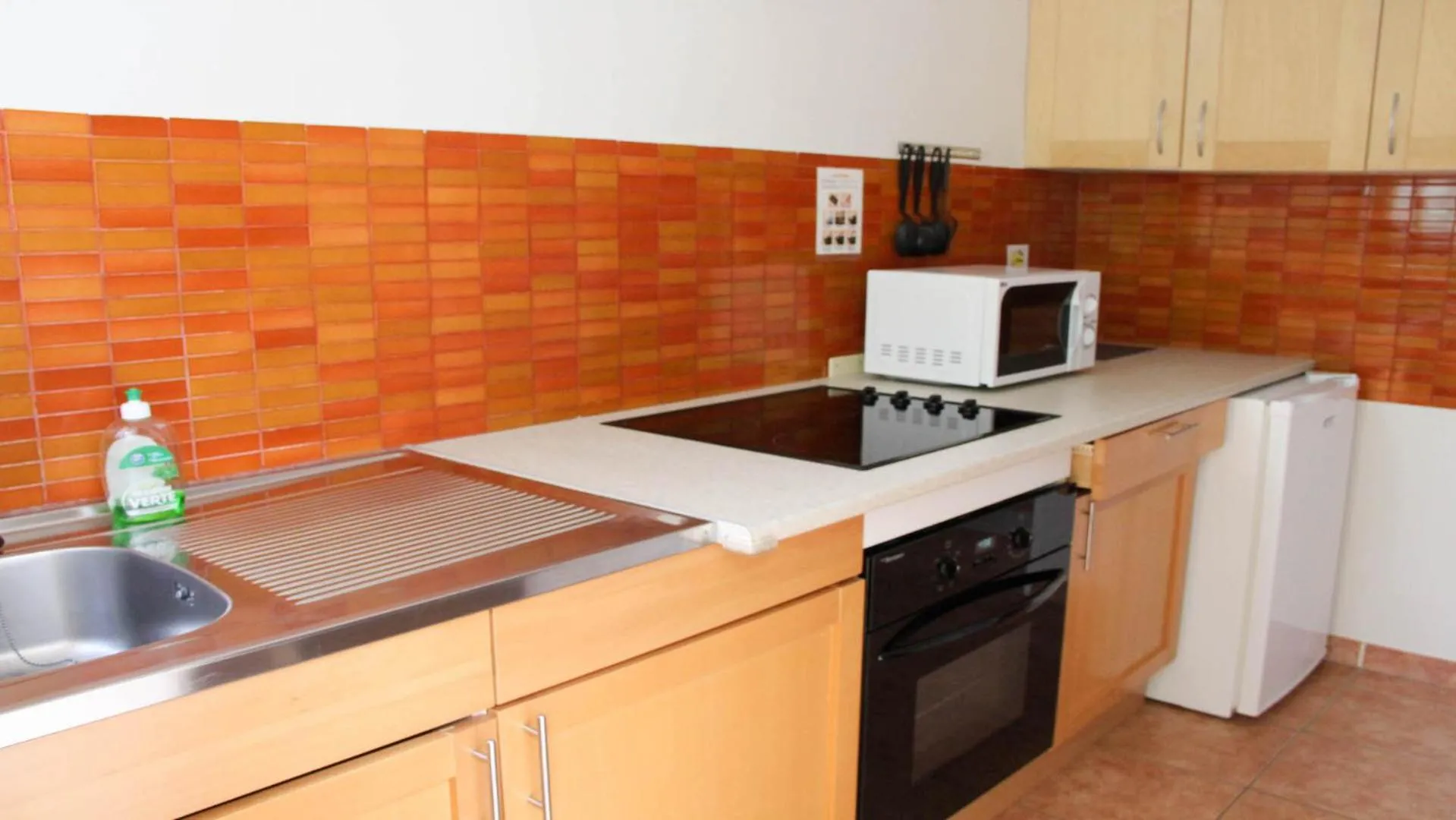 Kitchen or kitchenette in Résidence les Caraibes