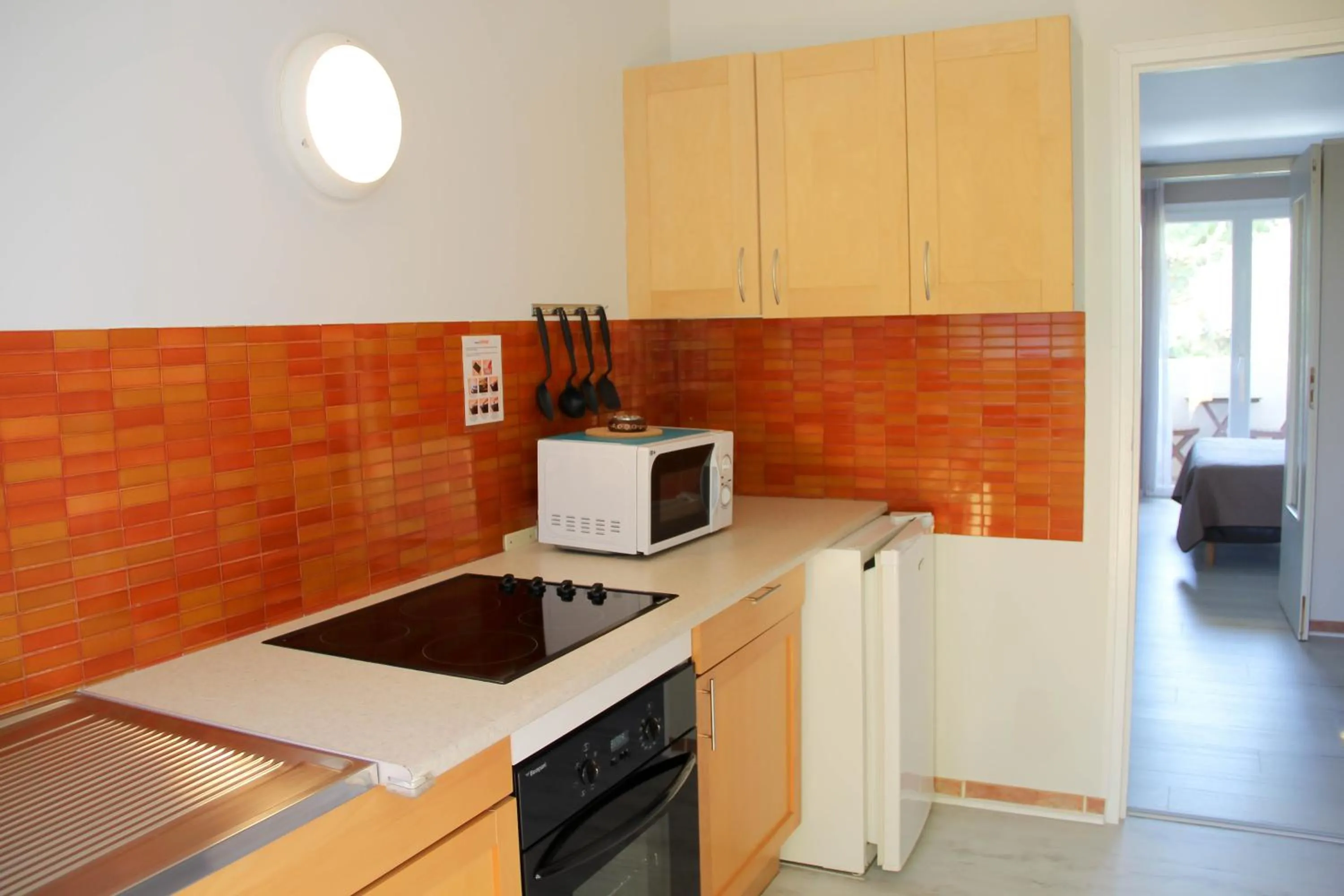 Kitchen or kitchenette in Résidence les Caraibes