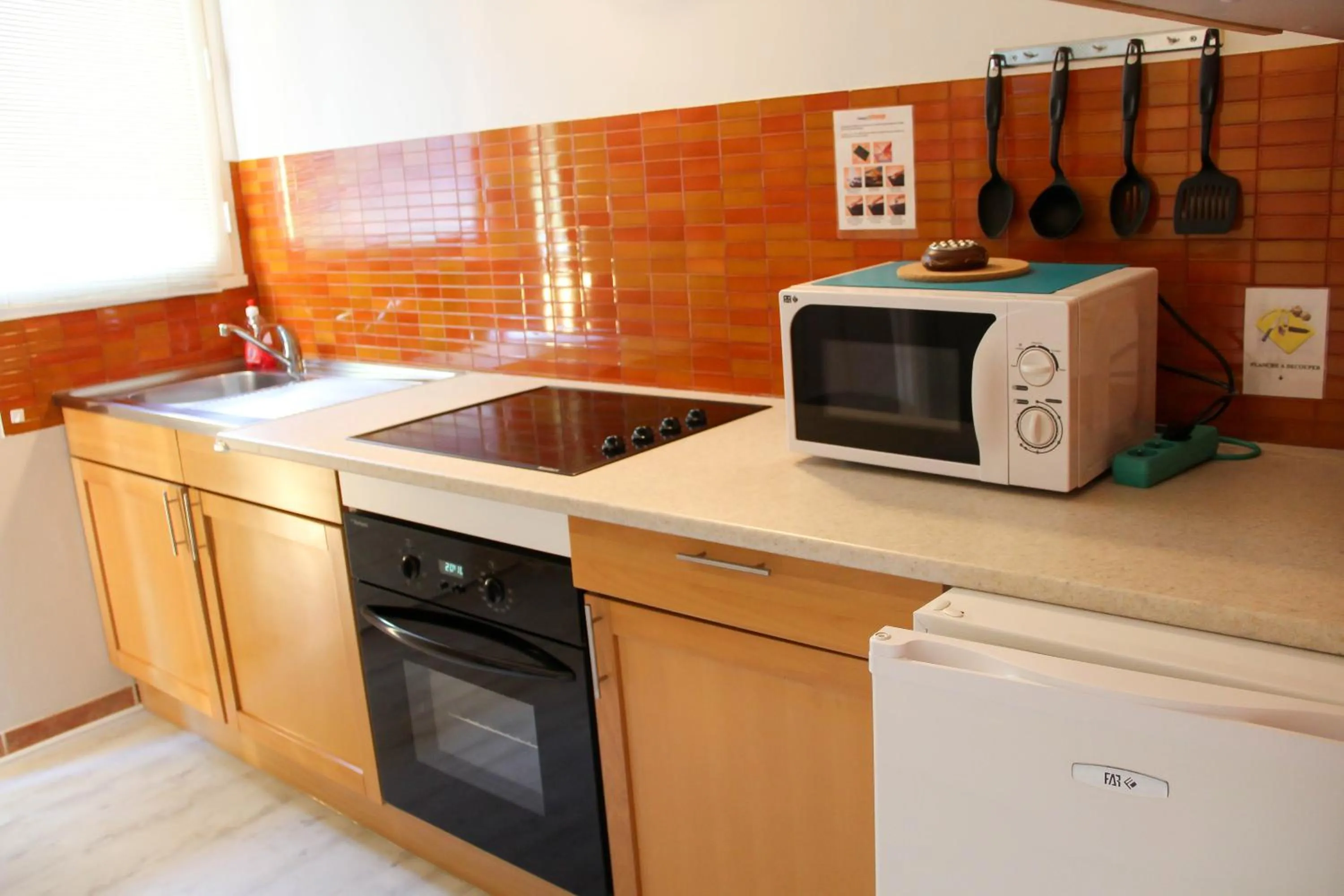 Kitchen or kitchenette in Résidence les Caraibes