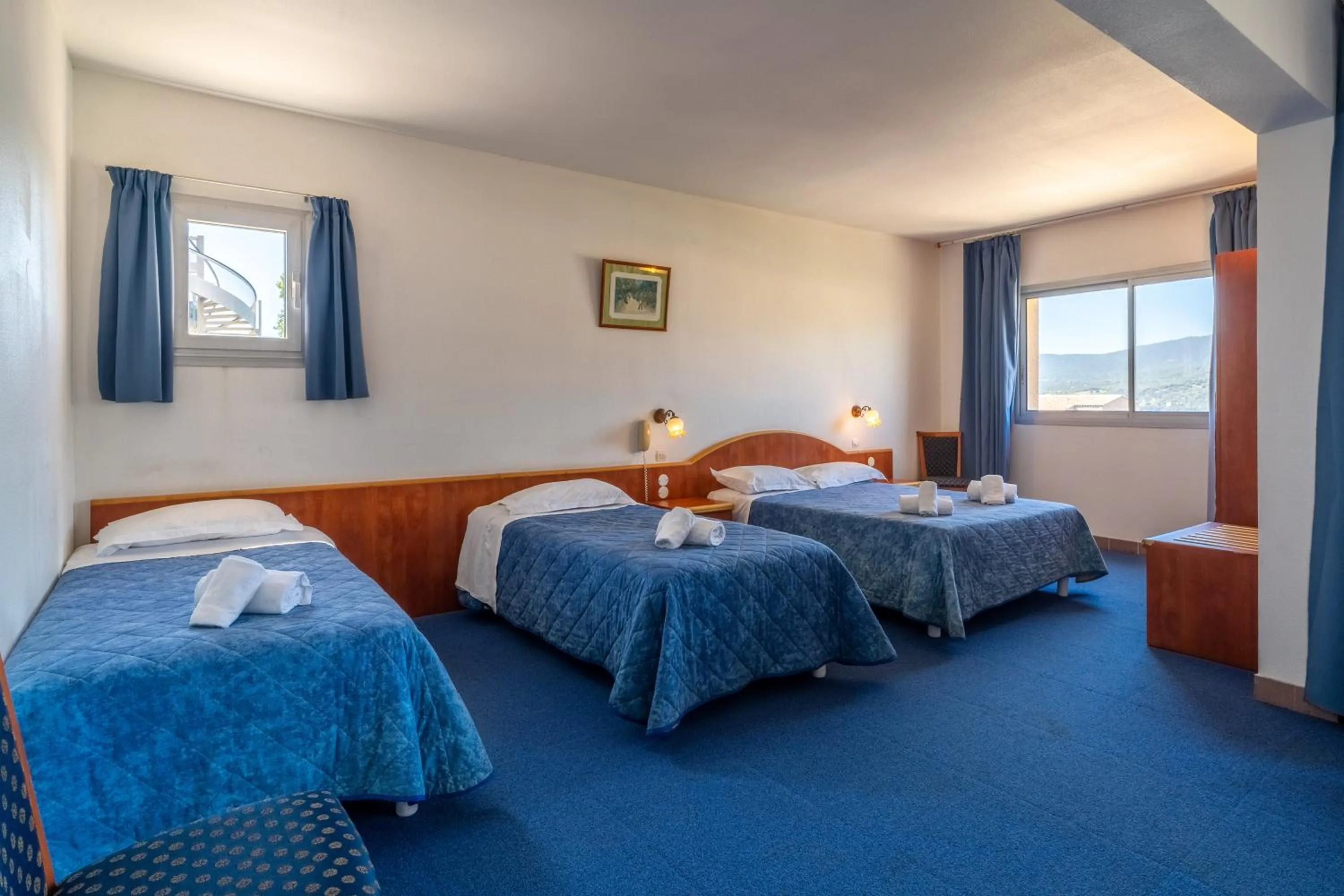 Bed in Hotel Hibiscus