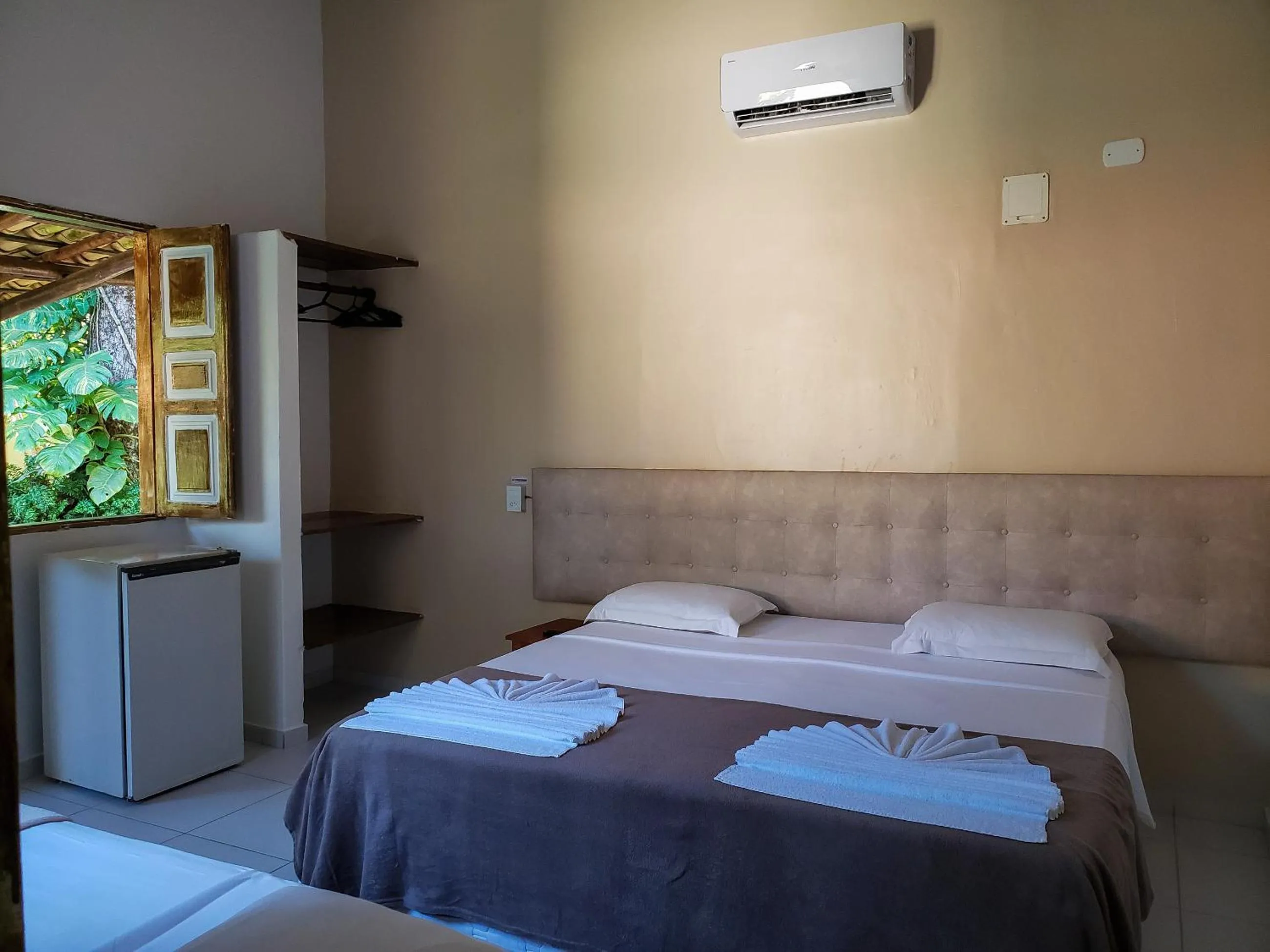 Bed in Pousada Tropical