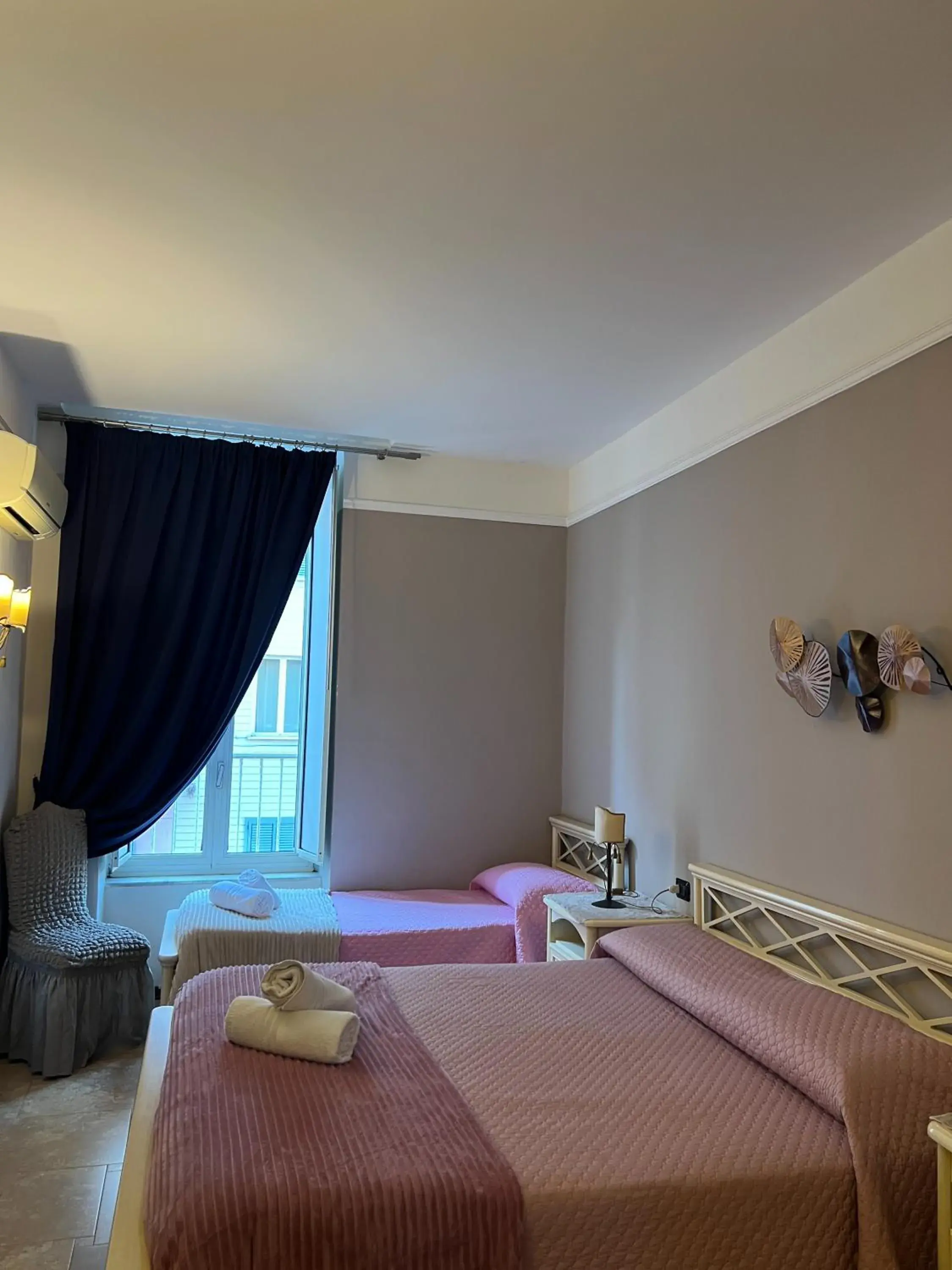 Triple Room in B&B La Dimora Di Nettuno Triple Room in B&B La Dimora Di Nettuno