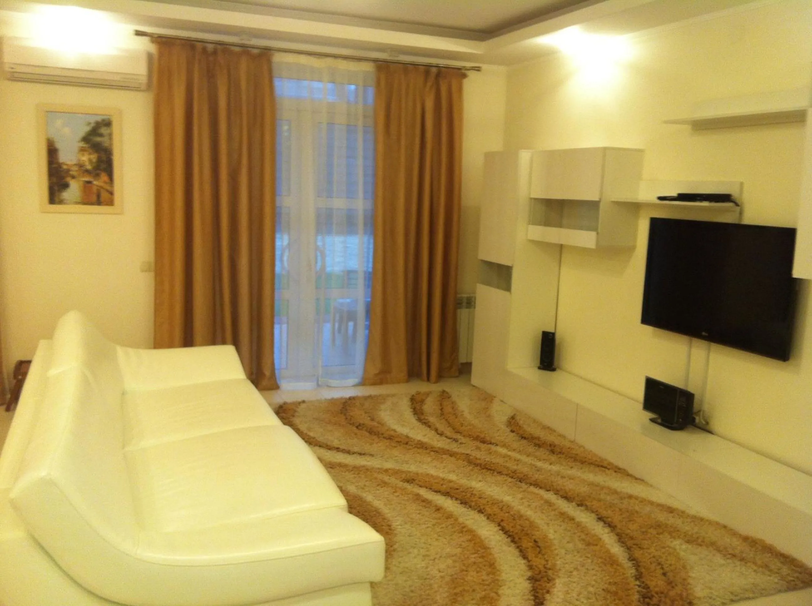 Seating area, Bed in ABC Apartments Business Class