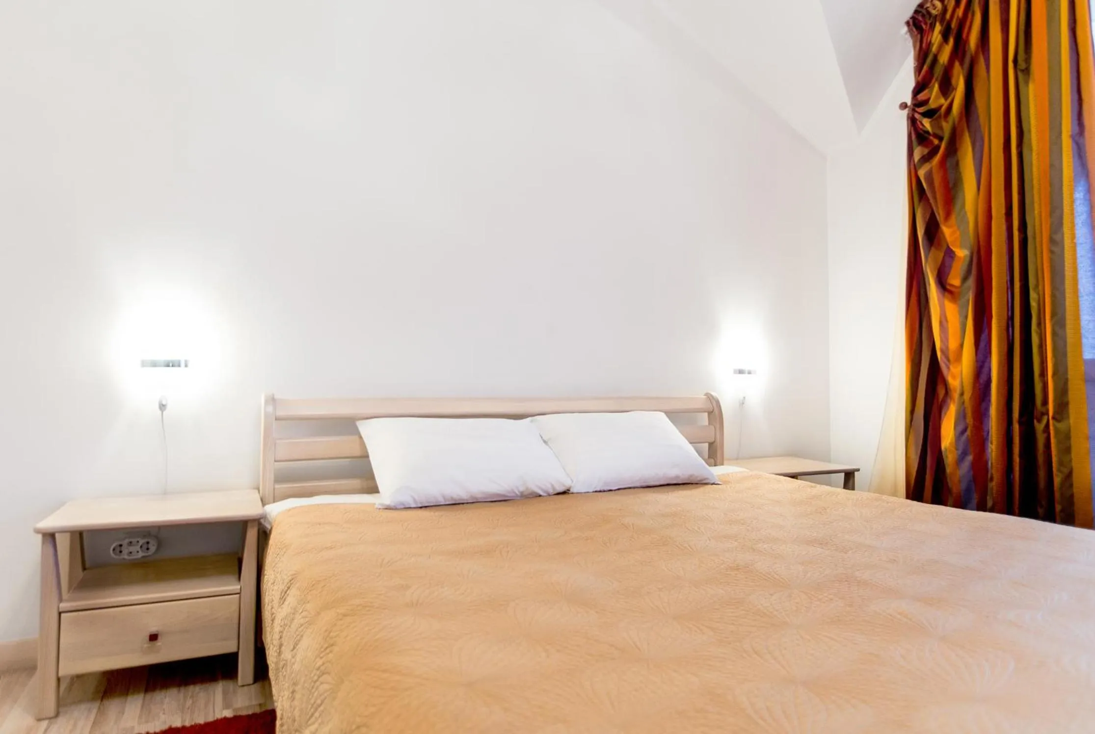 Bed in ABC Apartments Business Class