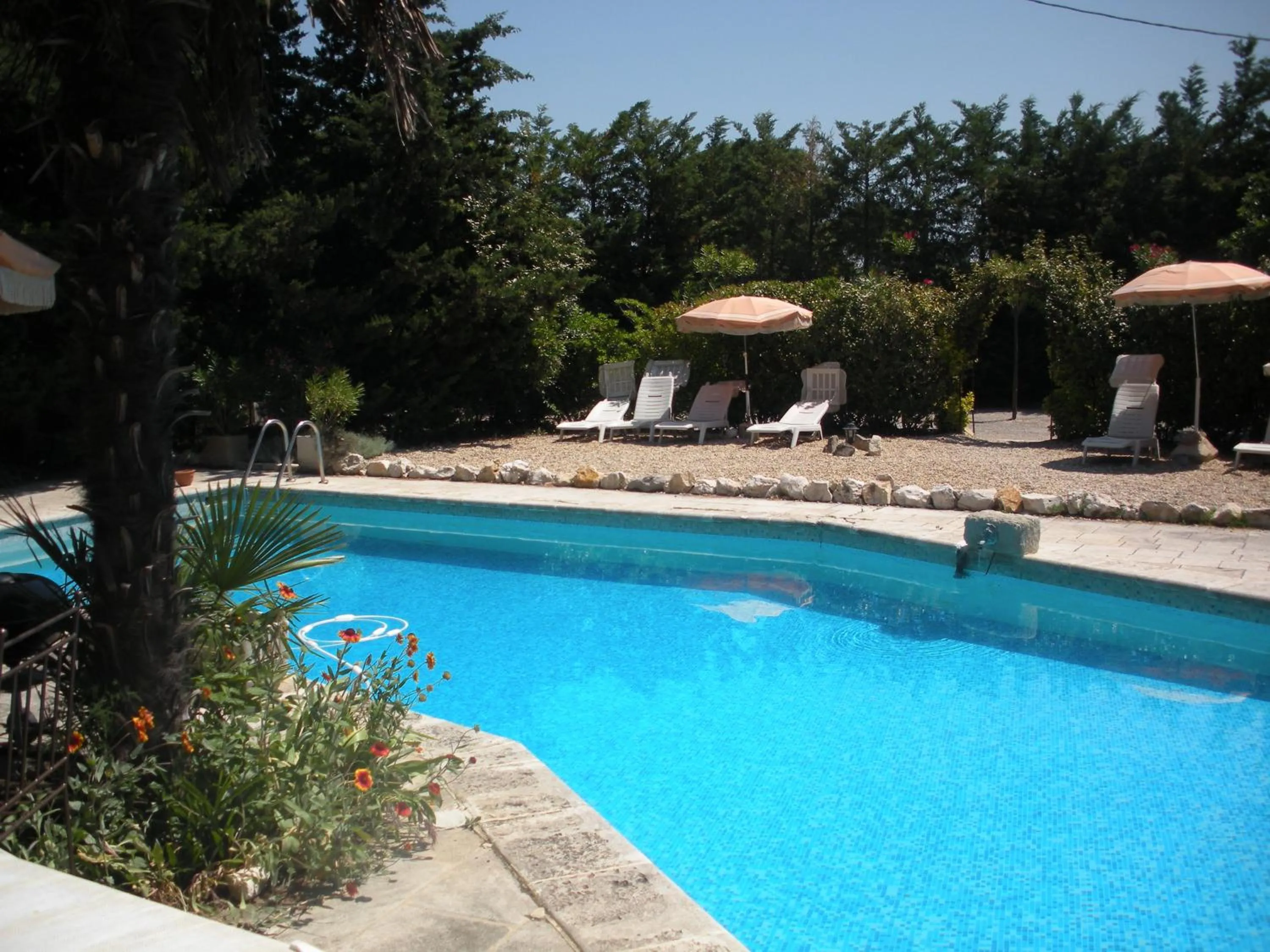 Swimming pool in Gites Climatisés Piscine Chauffée La Balancelle