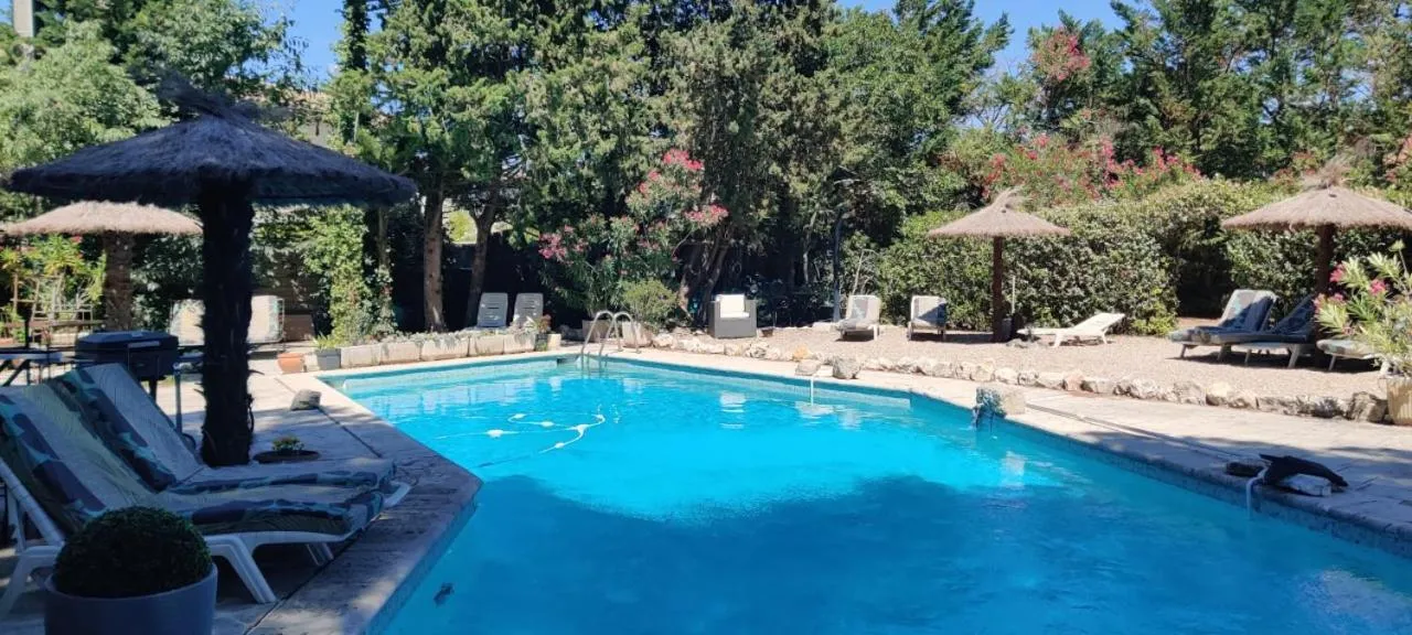 Swimming pool in Gites Climatisés Piscine Chauffée La Balancelle