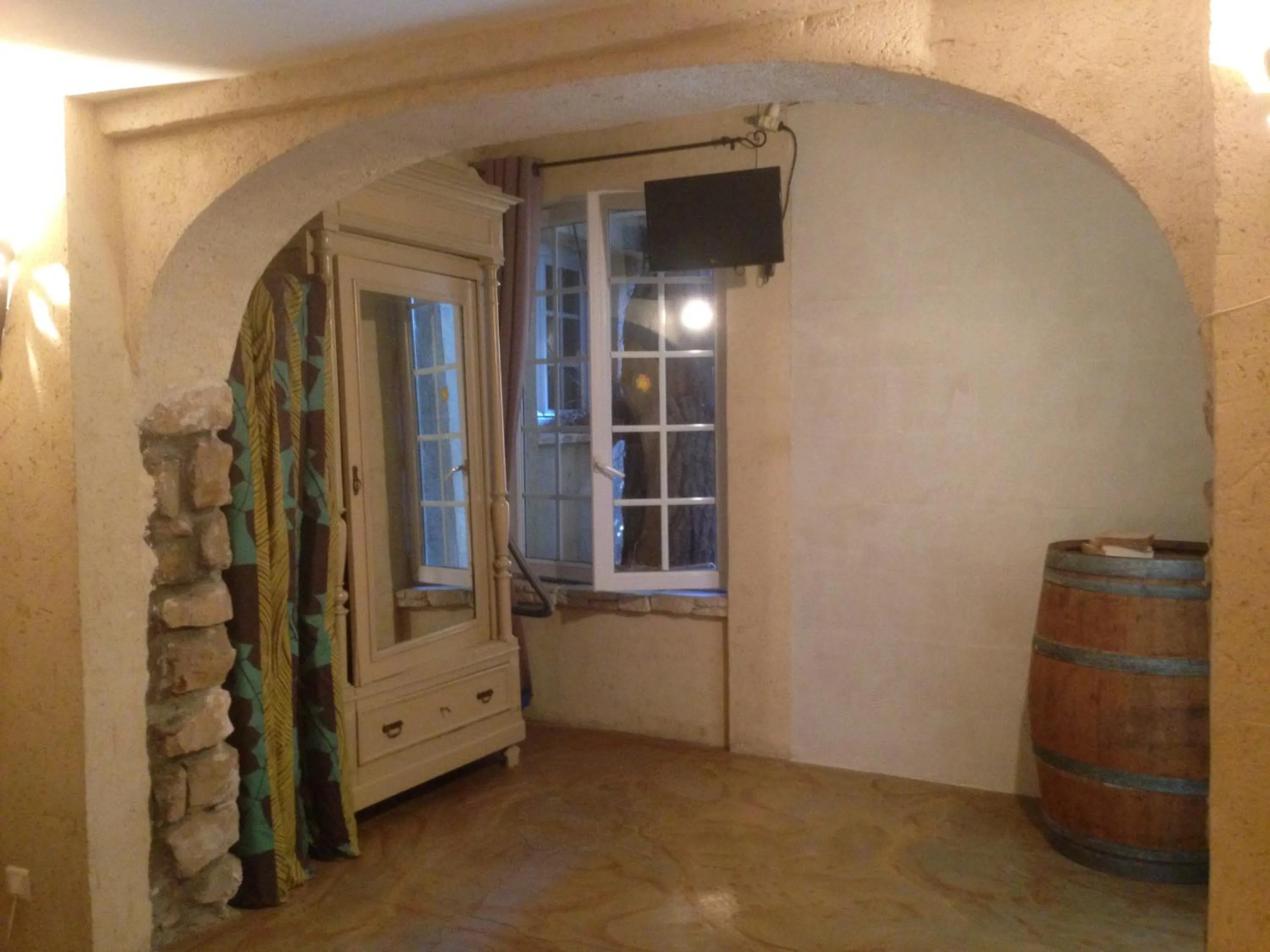 Bedroom in Gites Climatisés Piscine Chauffée La Balancelle