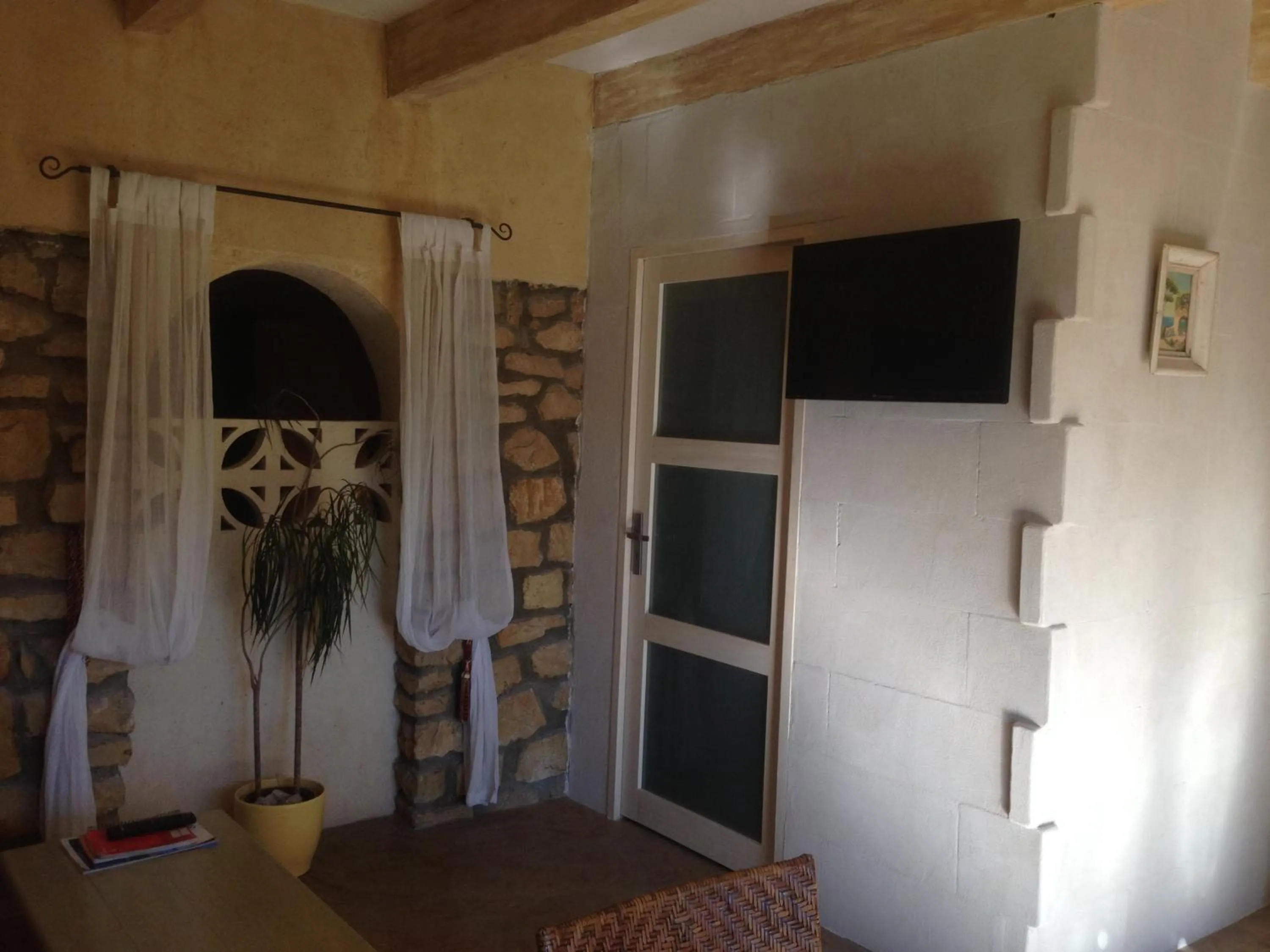 Bedroom in Gites Climatisés Piscine Chauffée La Balancelle
