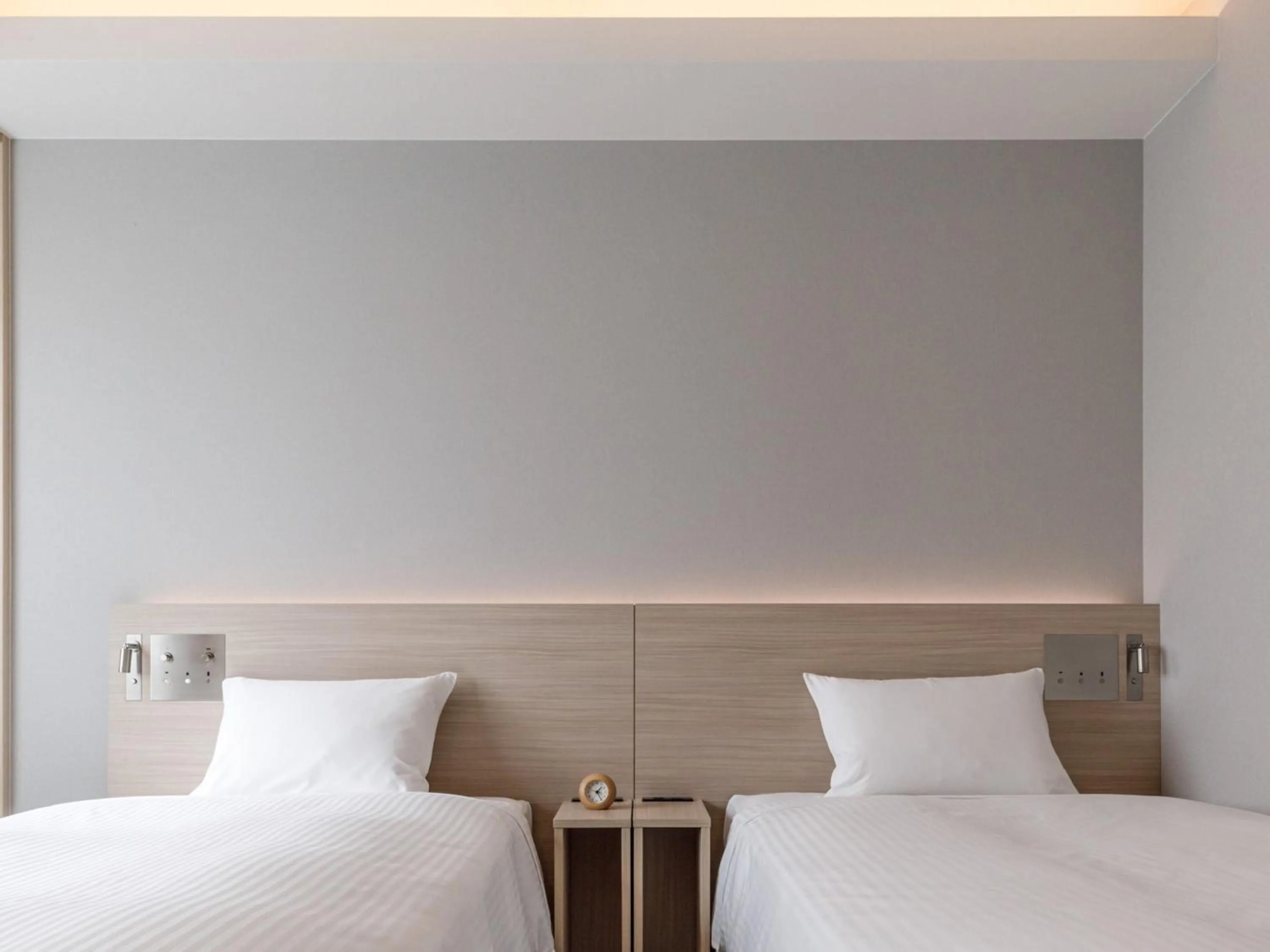 Photo of the whole room, Bed in Nishitetsu Hotel Croom Nagoya