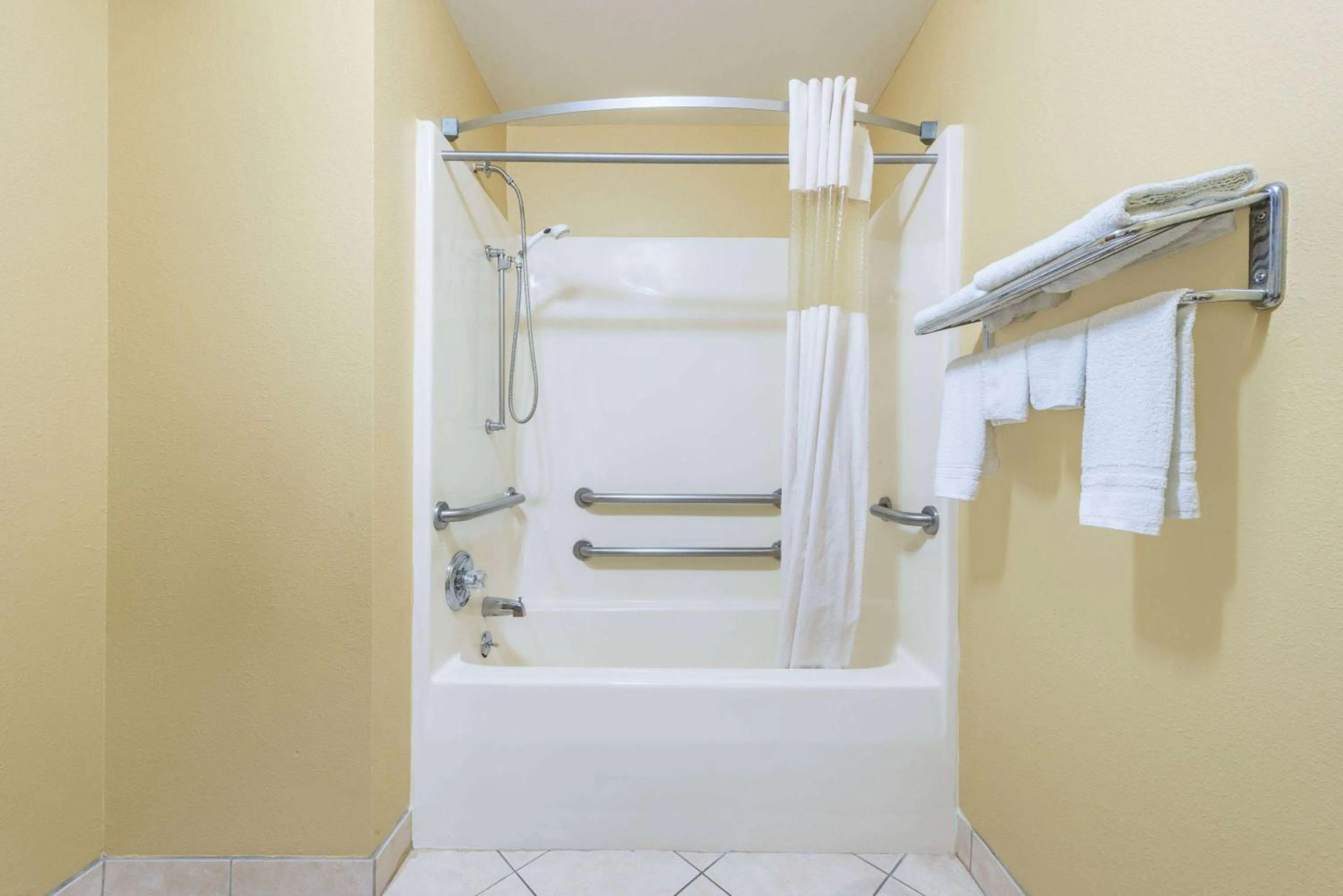 Photo of the whole room in Super 8 by Wyndham Troy IL/St. Louis Area