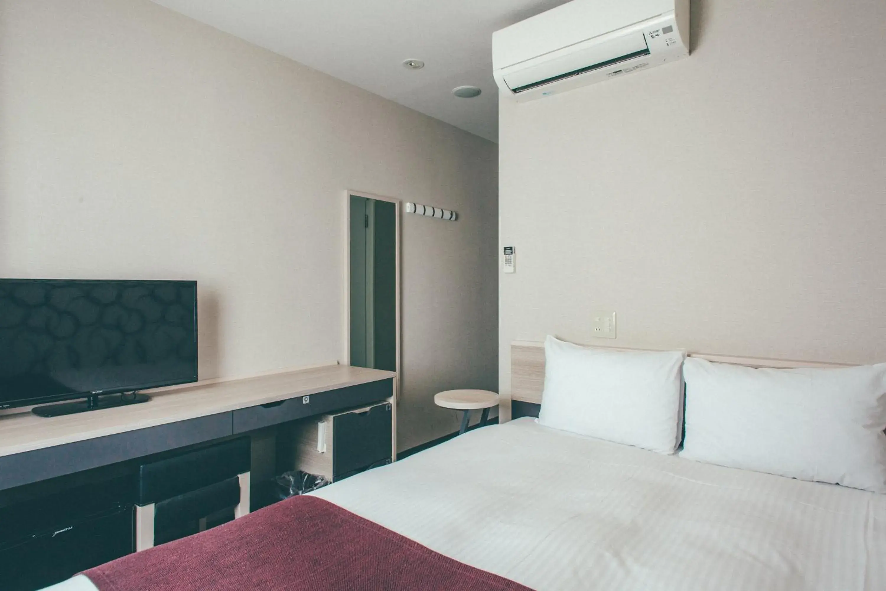 Bed in Kuretake Inn Nankai Sakai-Ekimae Bed in Kuretake Inn Nankai Sakai-Ekimae