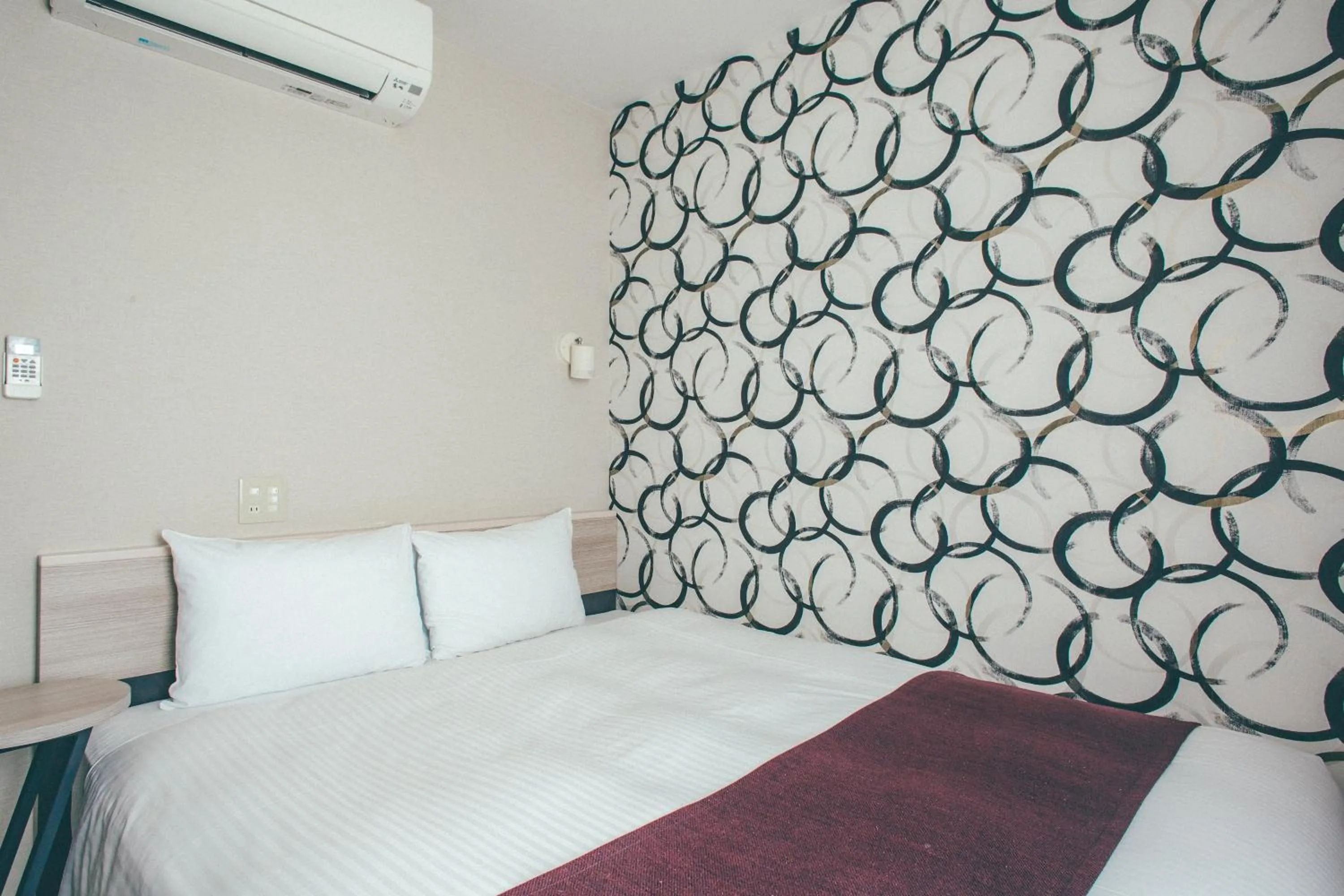 Bed in Kuretake Inn Nankai Sakai-Ekimae