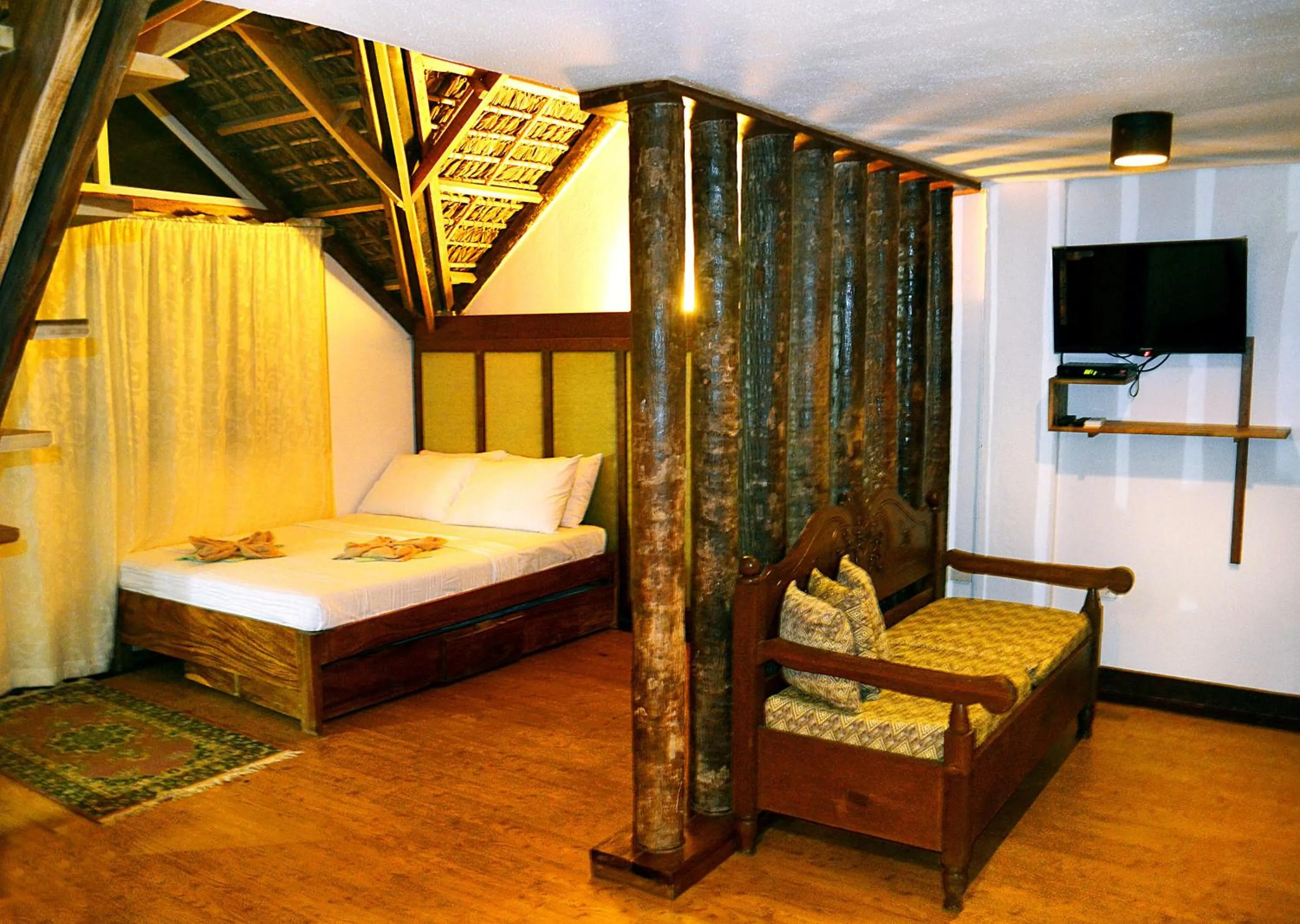 Bed in Alta Vista Ilocandia Inc.