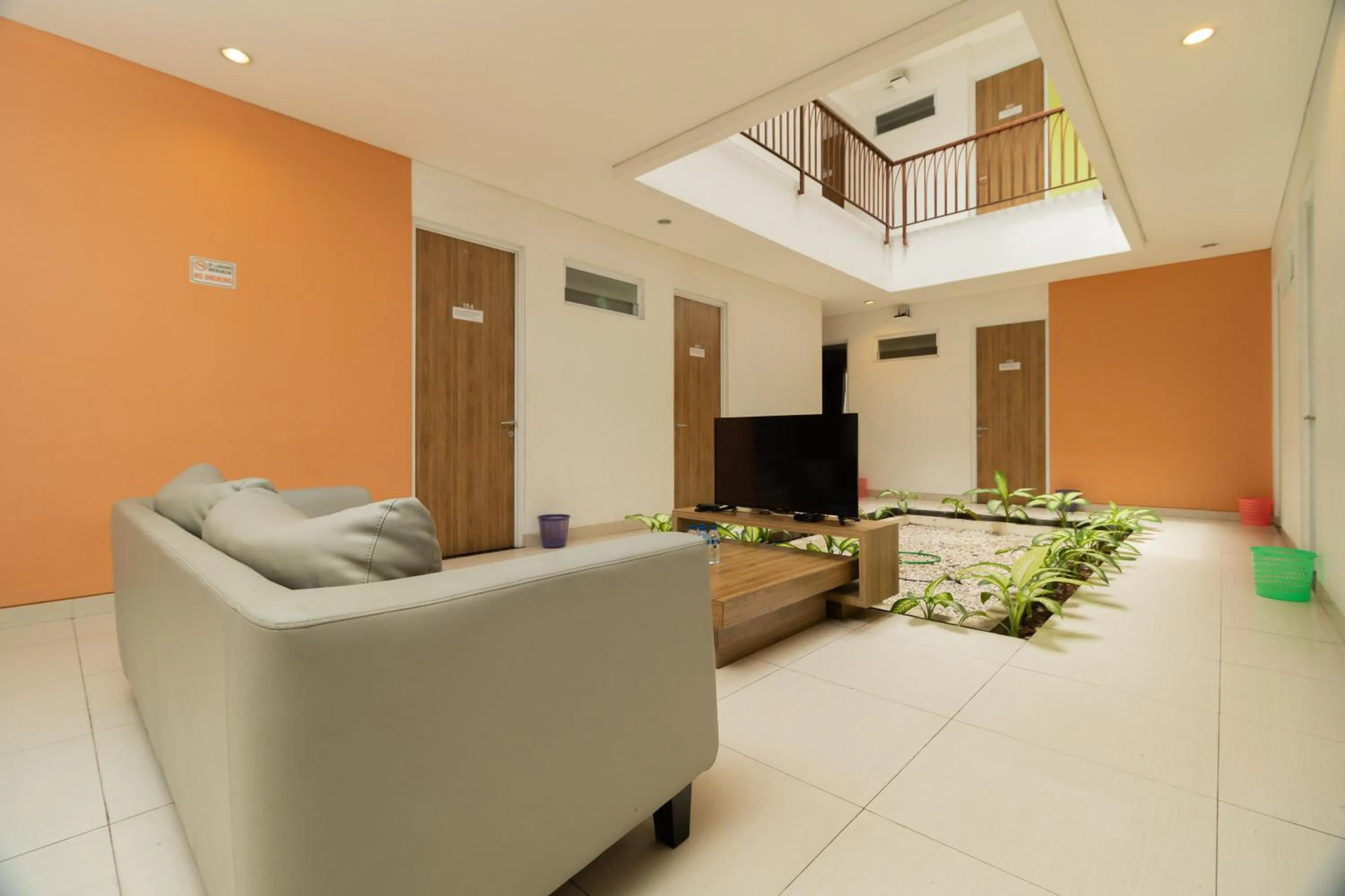 TV and multimedia in RedDoorz Syariah near Prasetya Mulya Cilandak campus