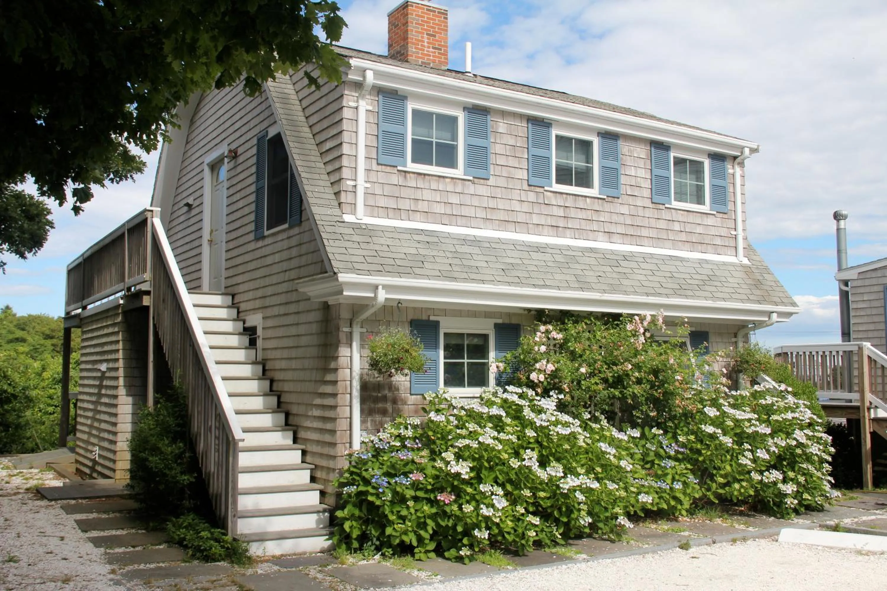 One Bedroom Suite with Deck, Kitchenette, and Partial Ocean View #1 in An English Garden