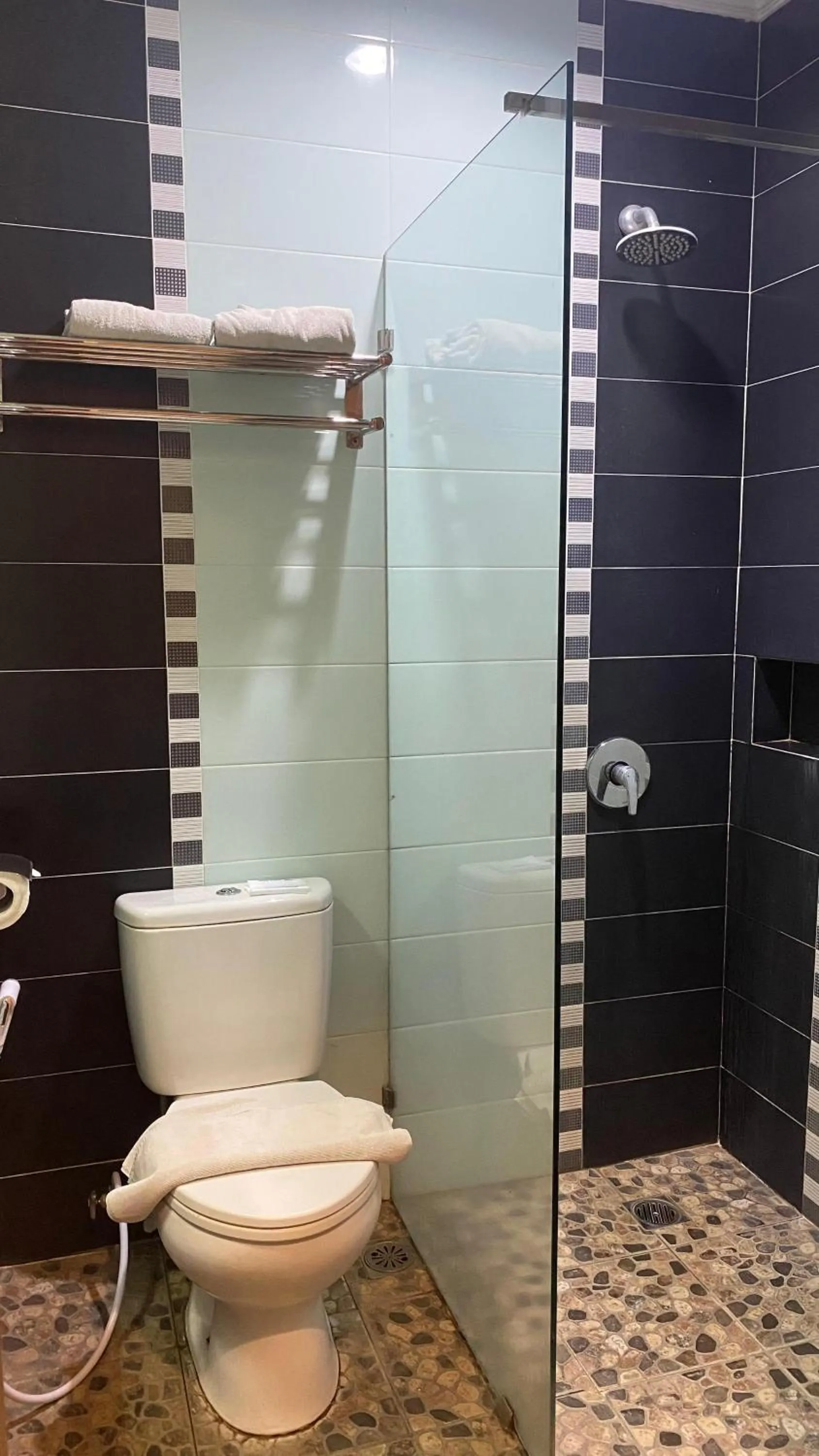 Bathroom in Royal Hotel and Villa Batu