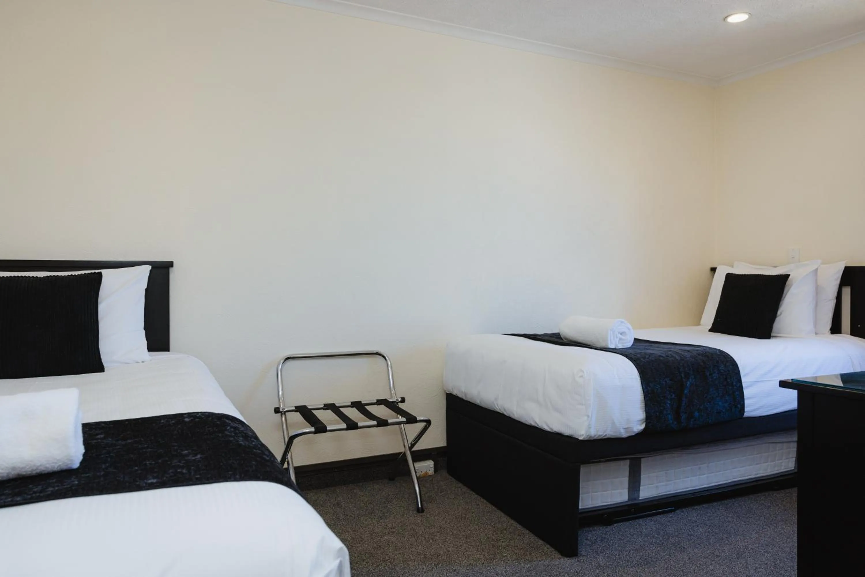 Bed in Palm City Motor Inn