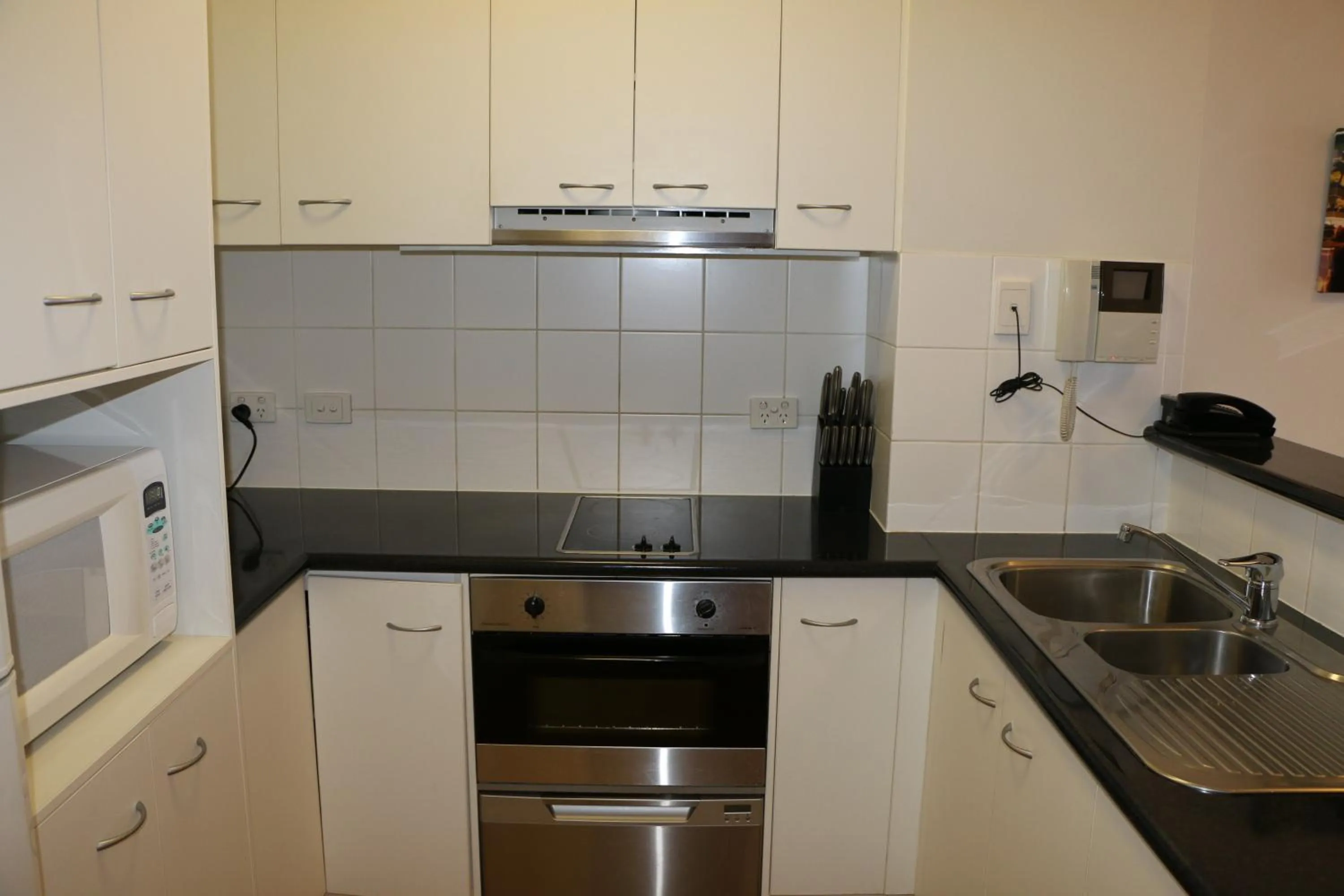 Kitchen or kitchenette in Frisco Apartments