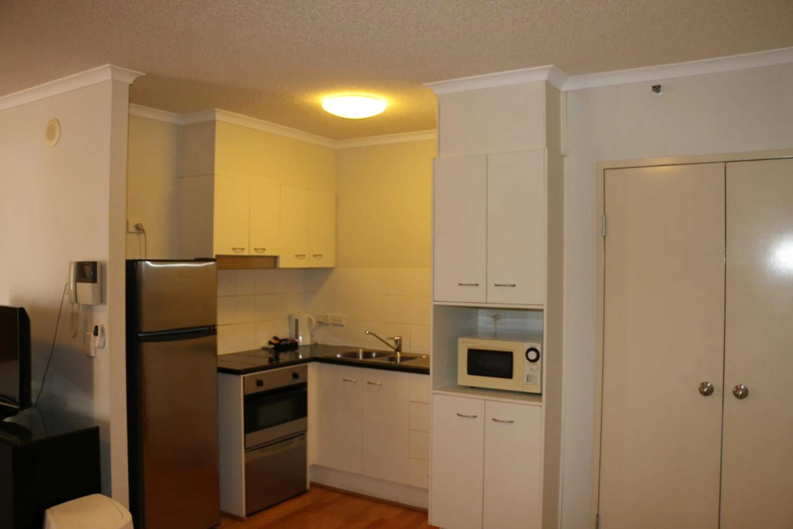 Communal kitchen in Frisco Apartments