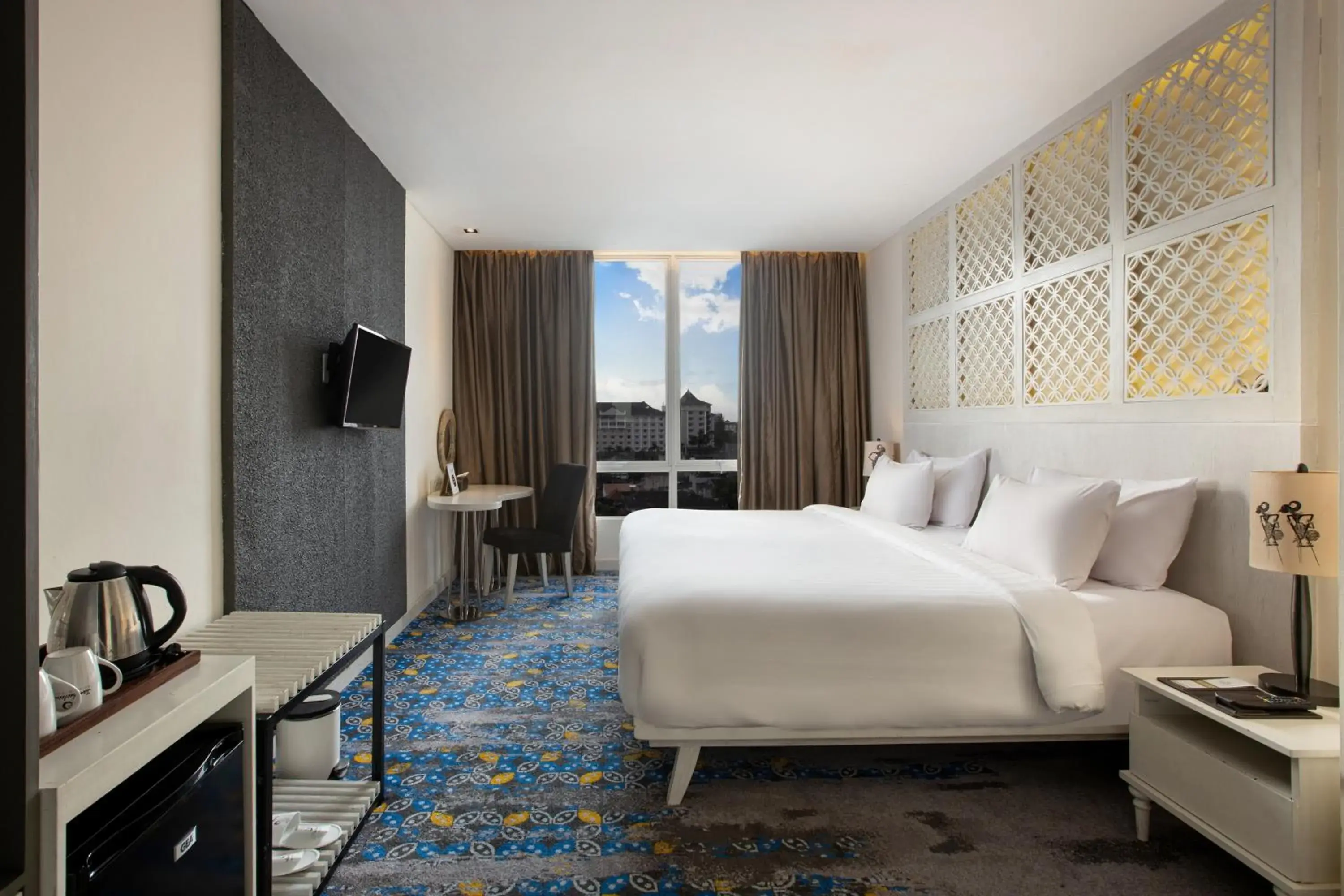 Bedroom, Bed in Jambuluwuk Malioboro Hotel Yogyakarta Bedroom, Bed in Jambuluwuk Malioboro Hotel Yogyakarta