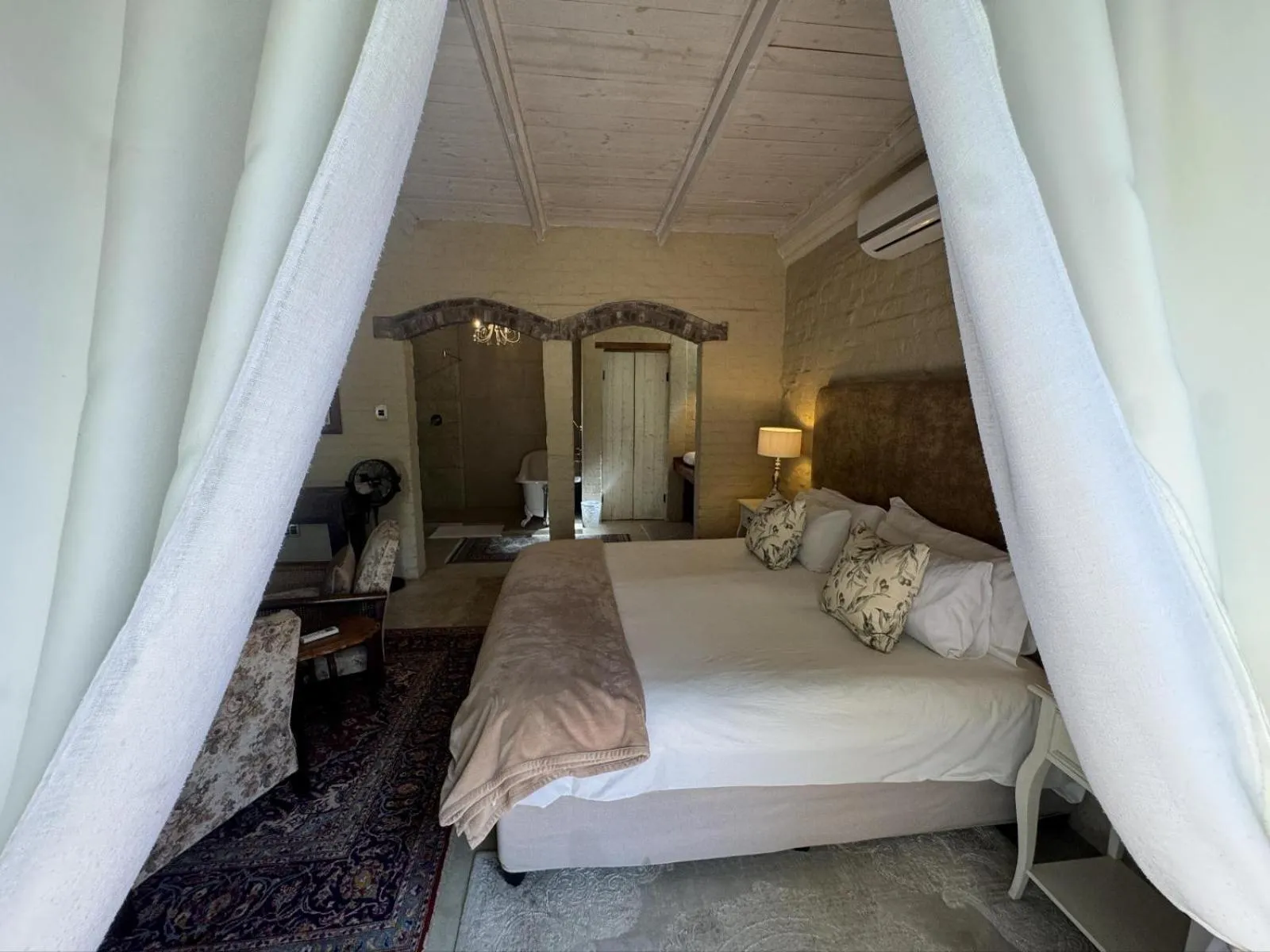 Bed in Hartland Garden Suite