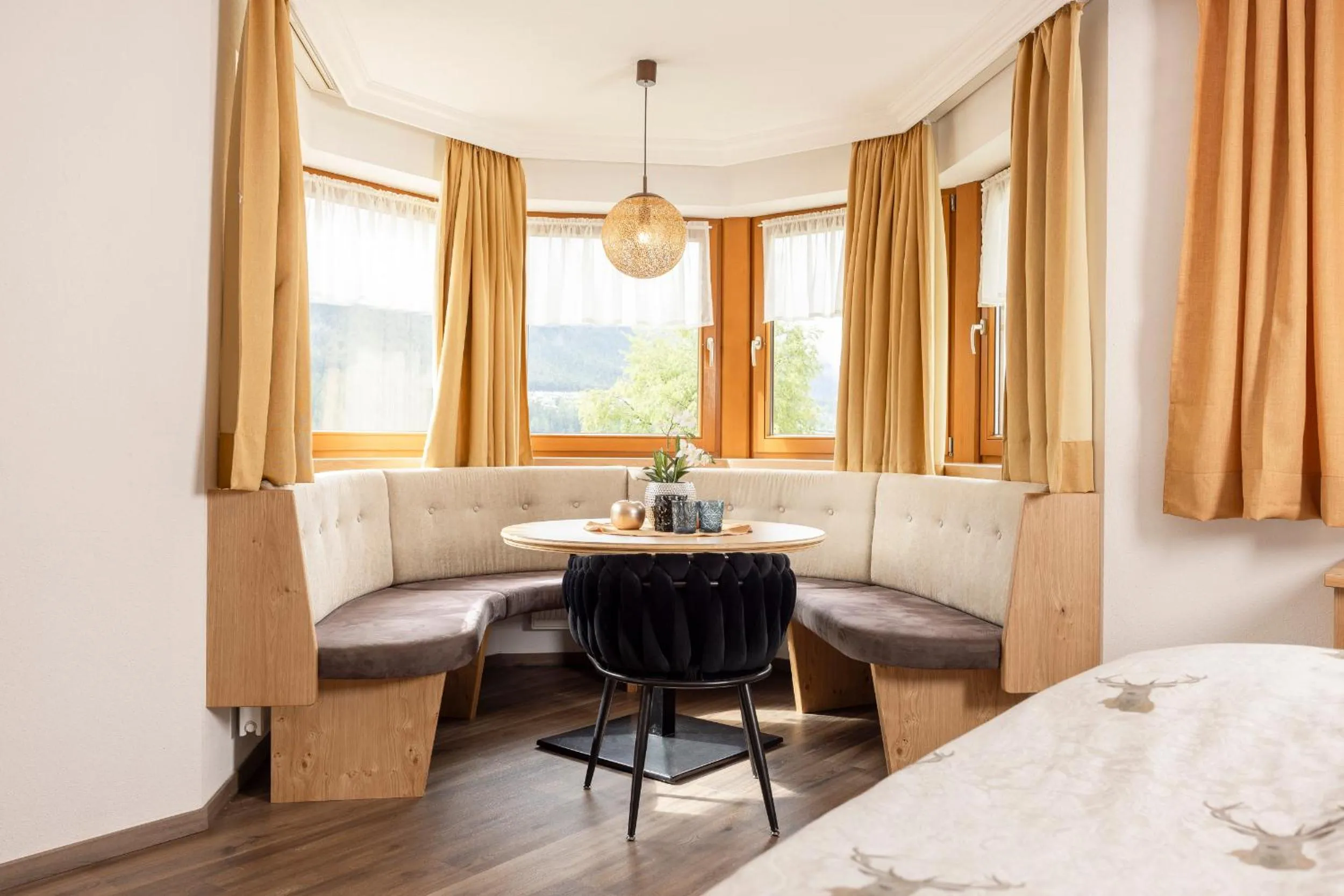 Seating area, Bed in Hotel Alphof Stubaital