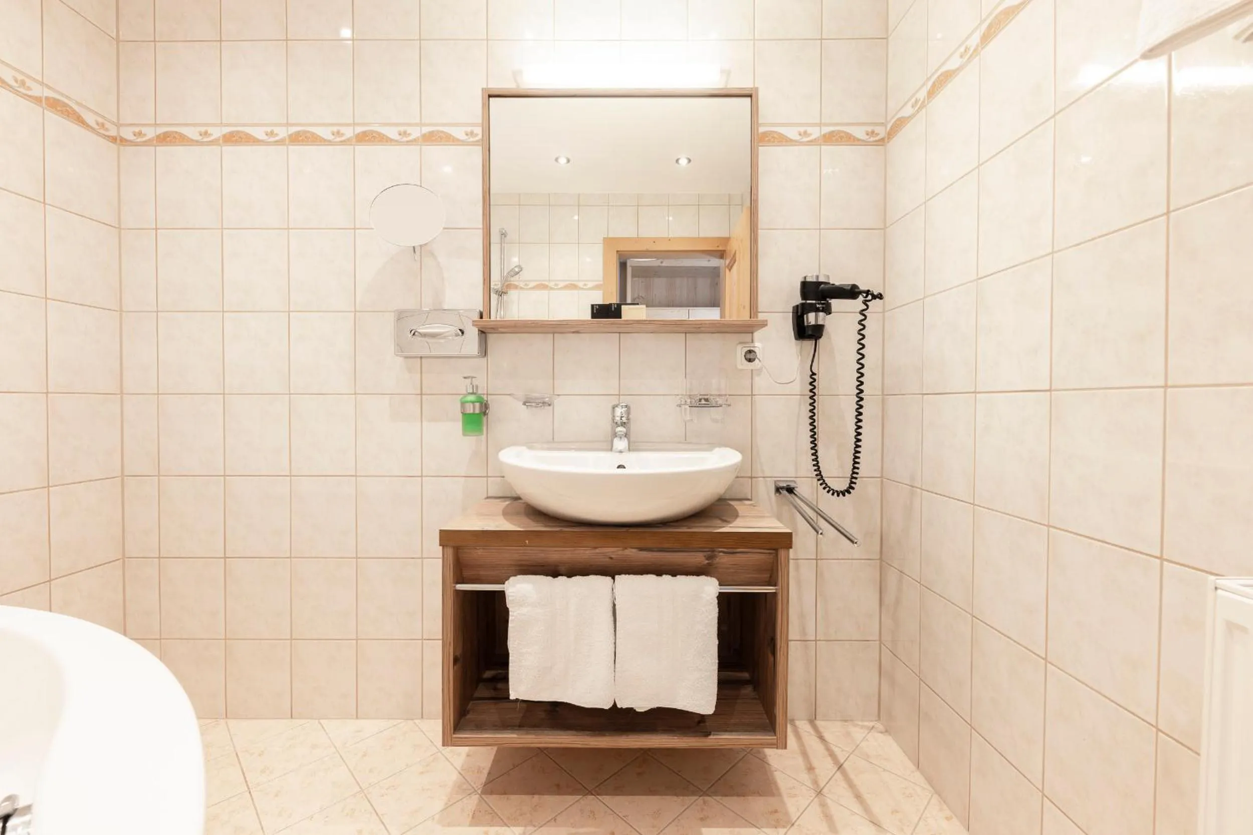 Bathroom in Hotel Alphof Stubaital
