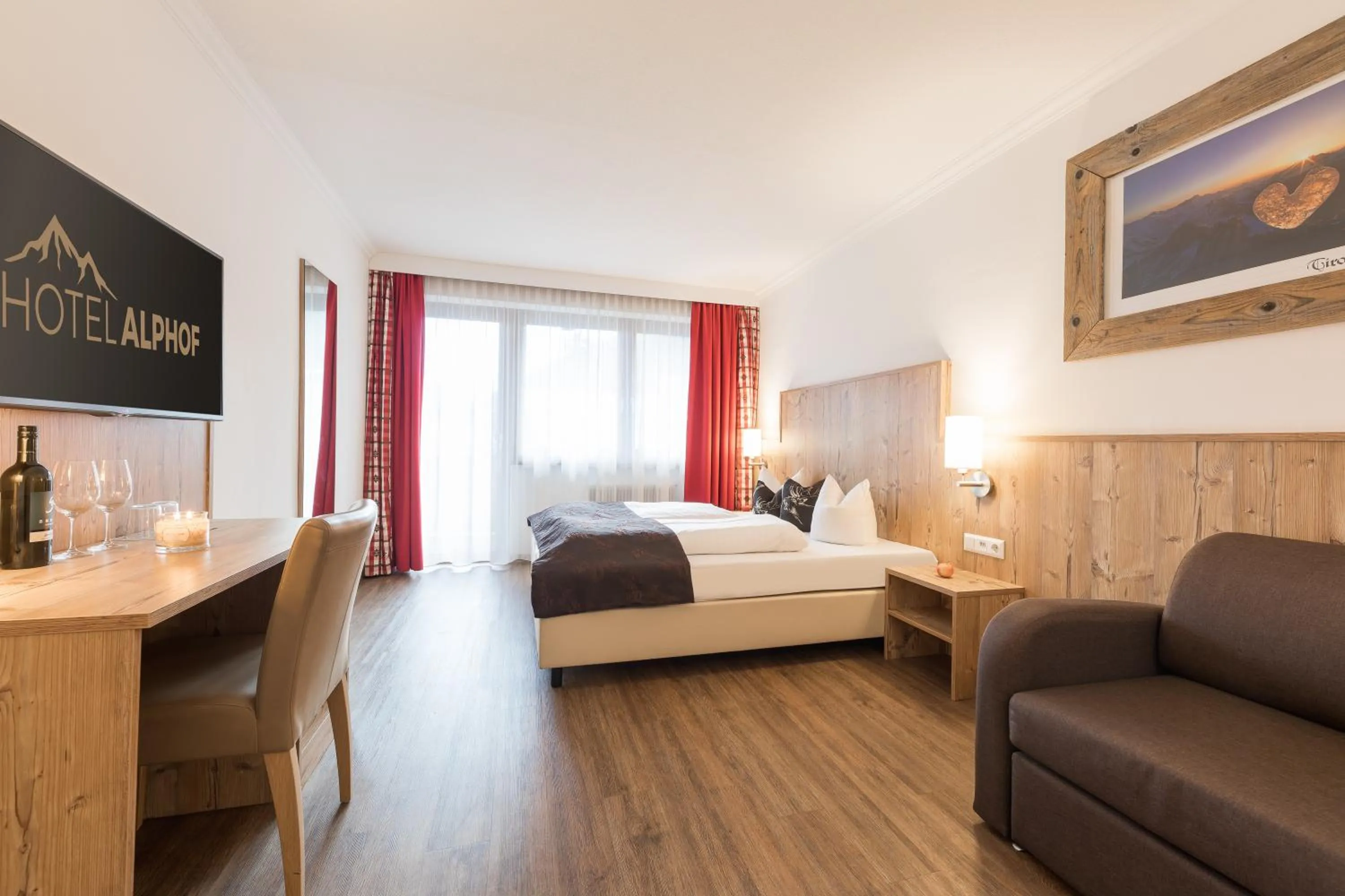 Photo of the whole room, Bed in Hotel Alphof Stubaital