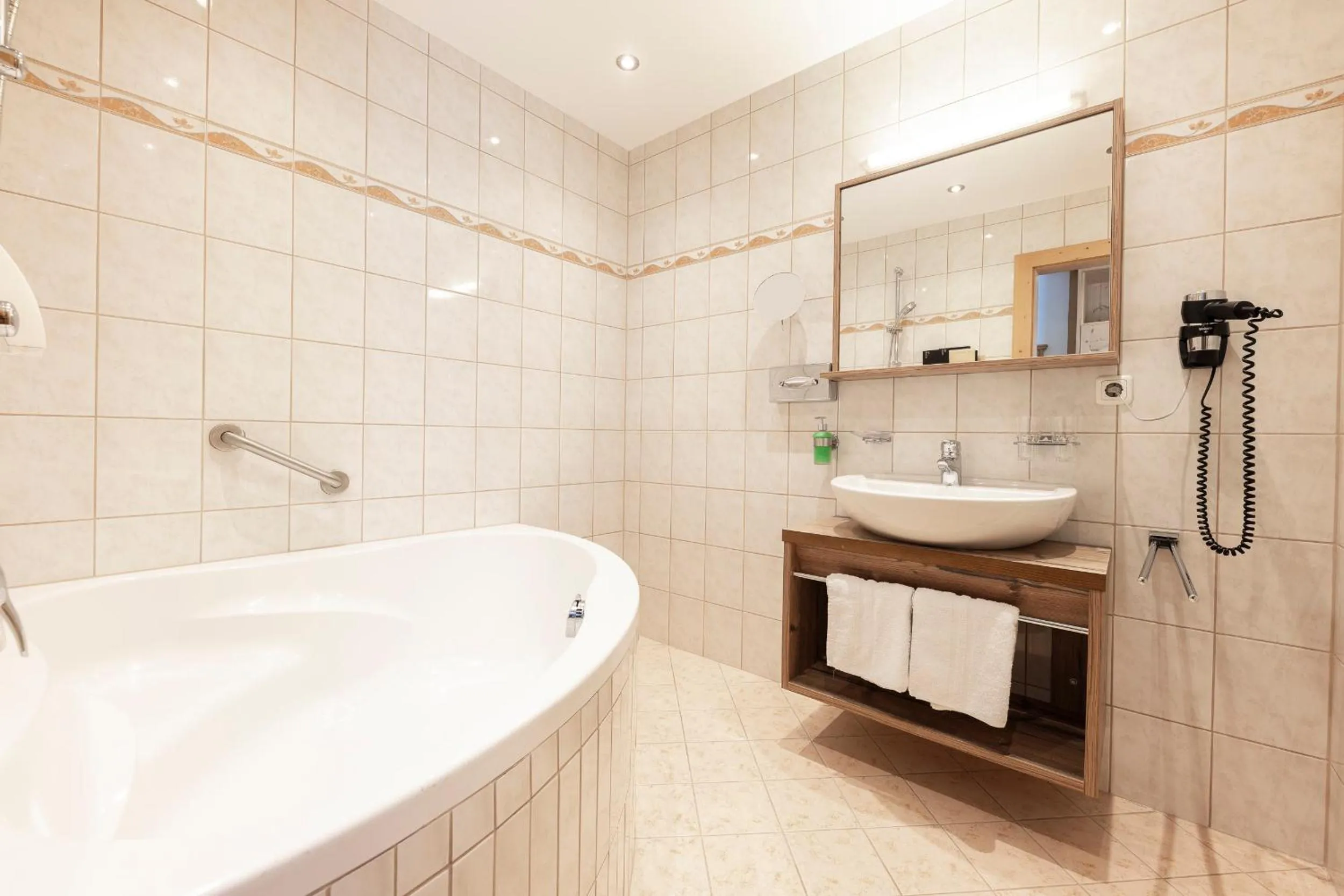 Bathroom in Hotel Alphof Stubaital