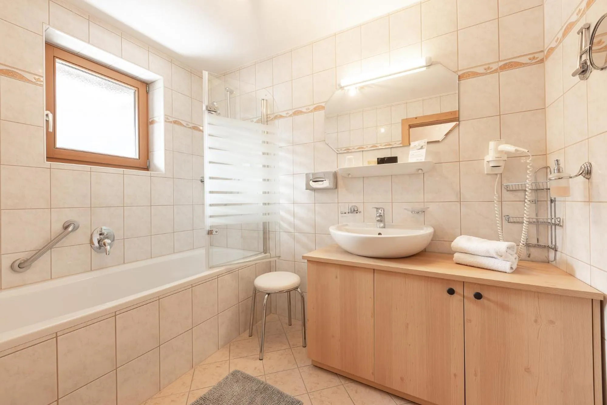 Bathroom in Hotel Alphof Stubaital