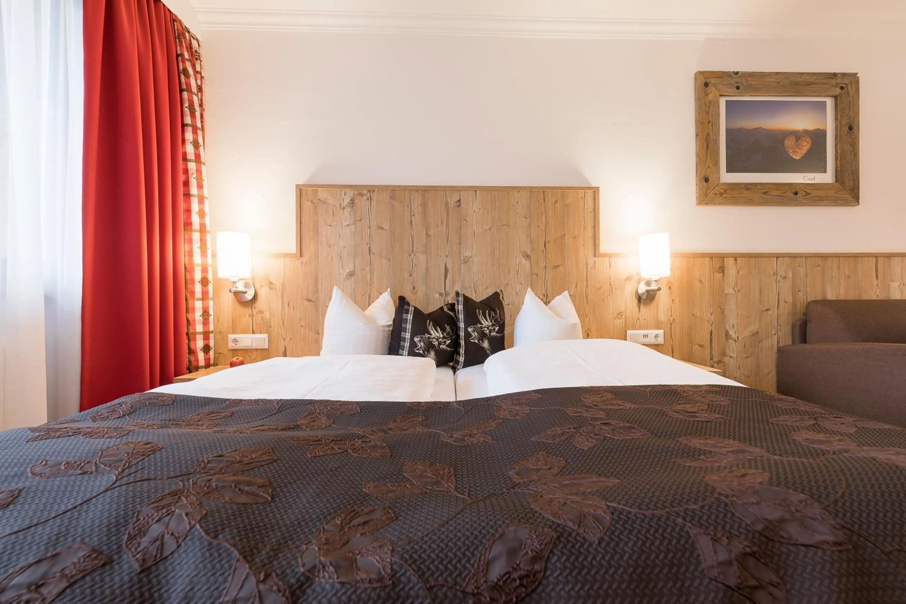 Photo of the whole room, Bed in Hotel Alphof Stubaital
