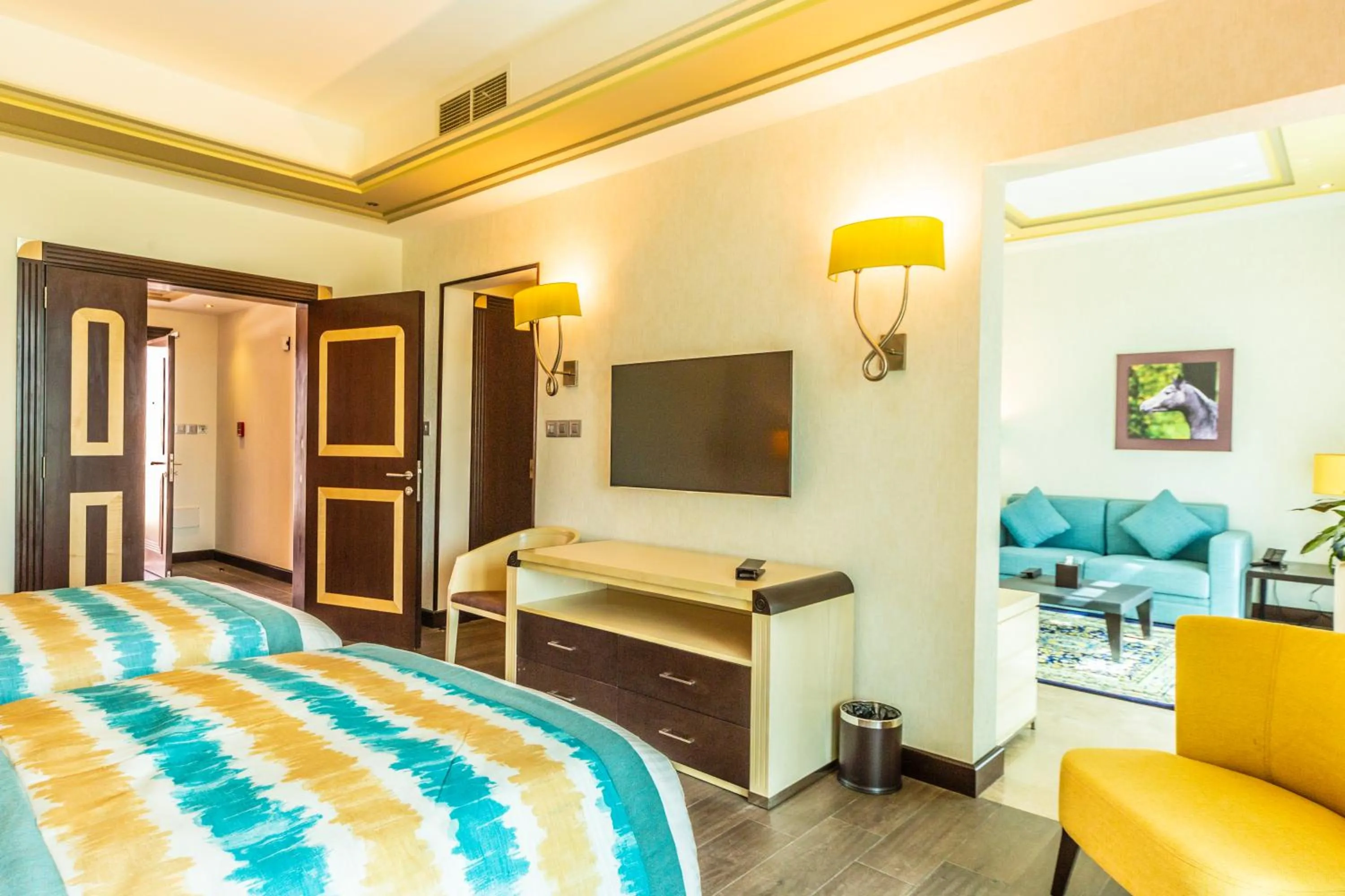 Communal lounge/ TV room, Bed in Retaj Salwa Resort & Spa