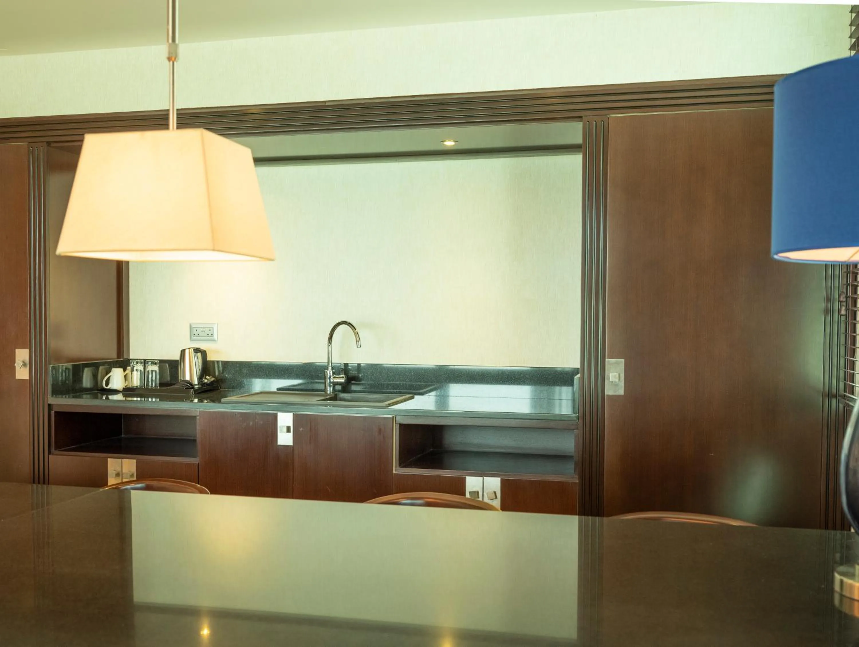 Kitchen or kitchenette in Retaj Salwa Resort & Spa