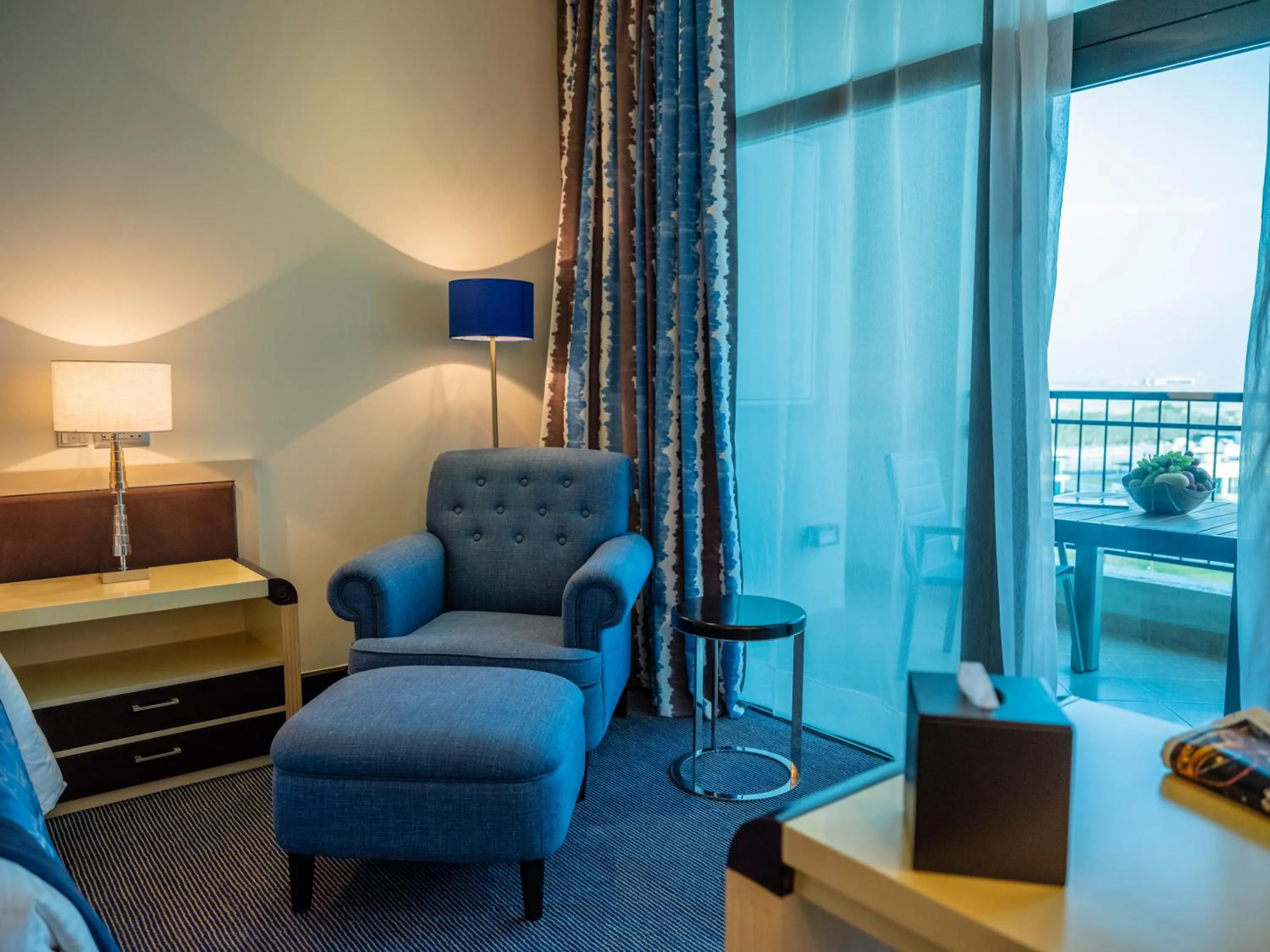 Seating area, Bed in Retaj Salwa Resort & Spa