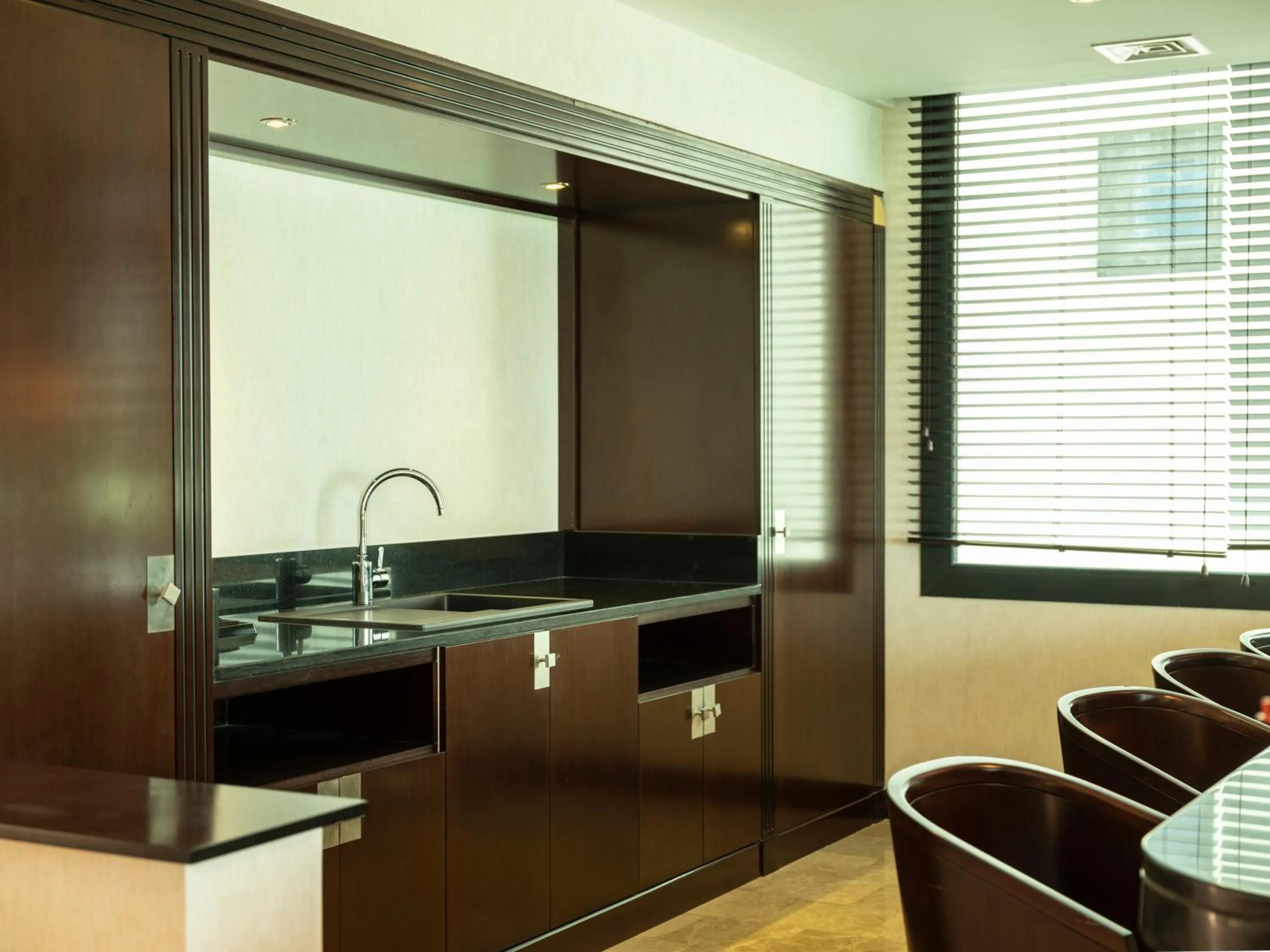 Kitchen or kitchenette in Retaj Salwa Resort & Spa