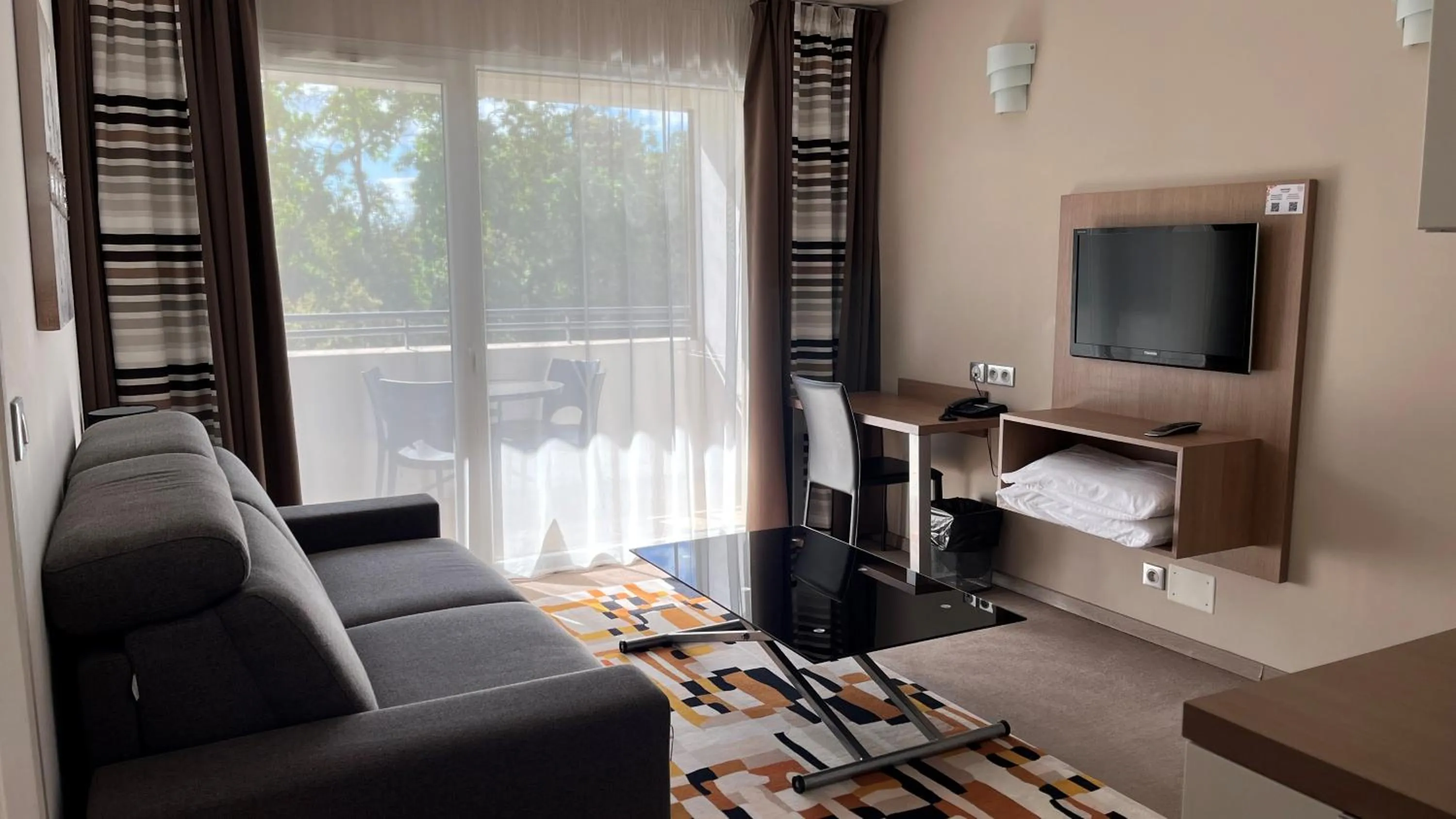 Living room in Forme-hotel & Spa Montpellier Sud-Est - Parc Expositions - Arena