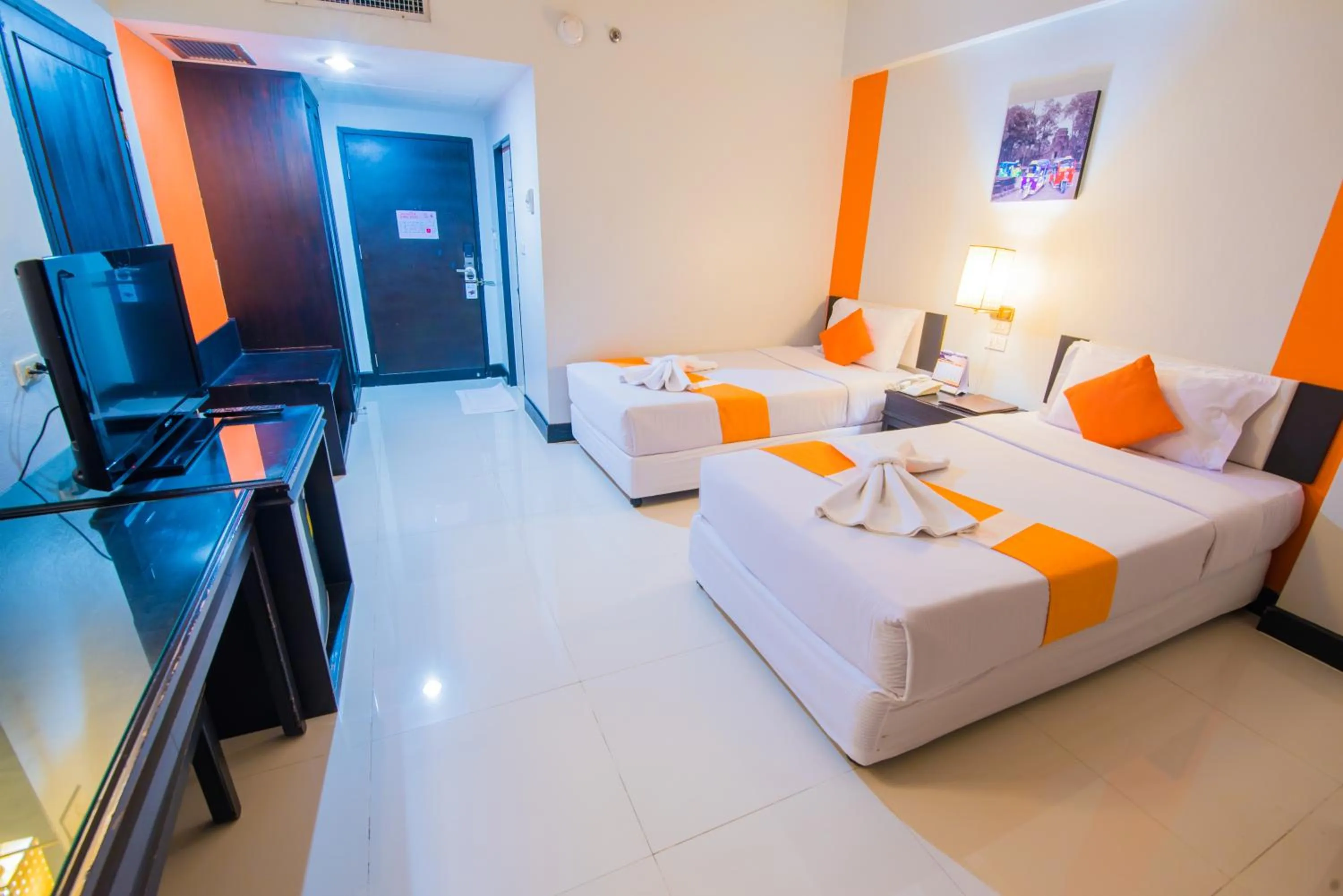 Bed in Asawann Hotel Nongkhai