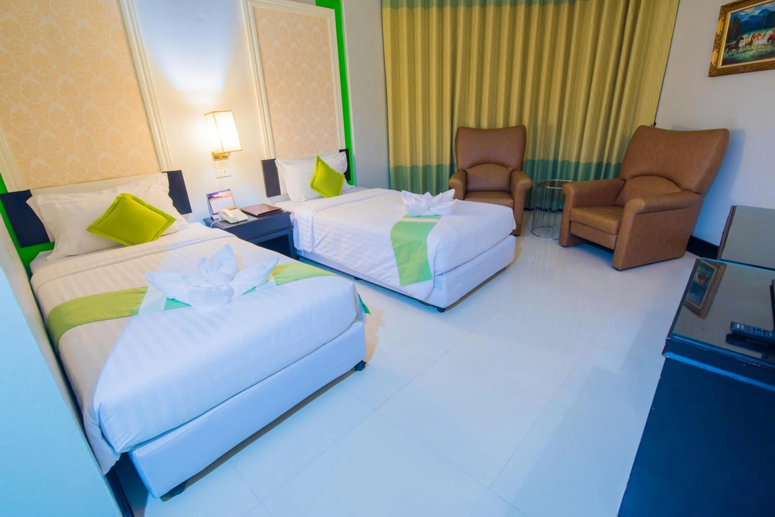 Bed in Asawann Hotel Nongkhai