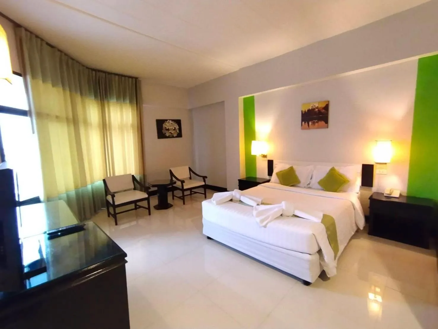 Bed in Asawann Hotel Nongkhai