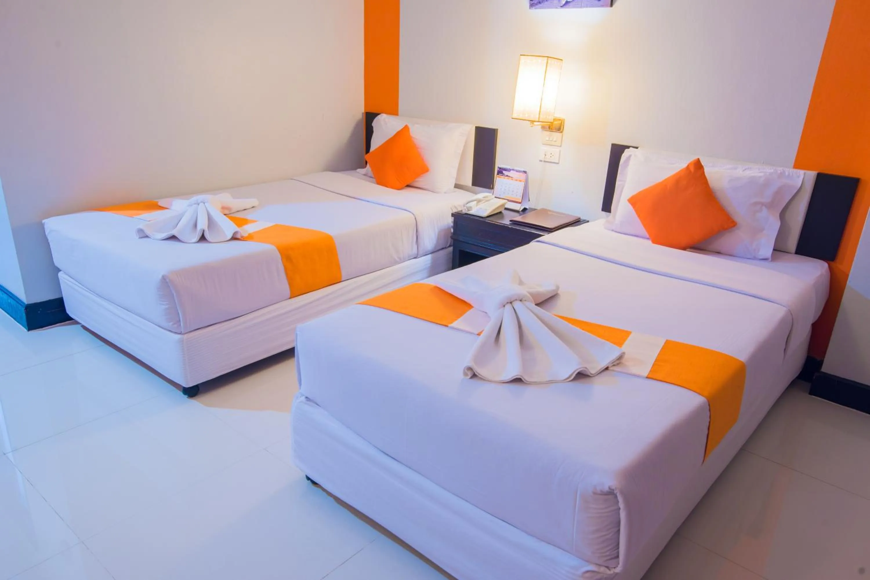 Bed in Asawann Hotel Nongkhai