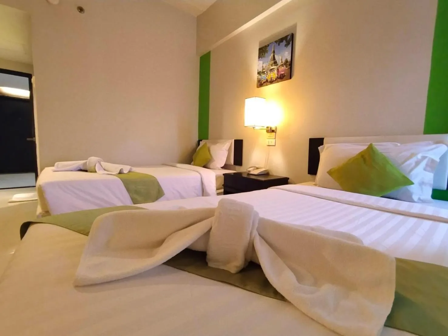 Bed in Asawann Hotel Nongkhai