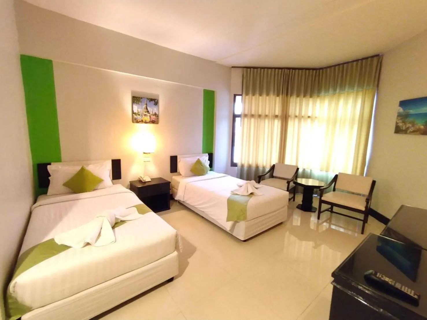 Bed in Asawann Hotel Nongkhai