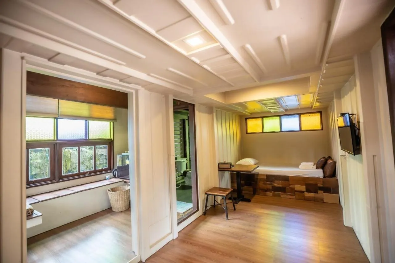 Bed in Suankaew Art Cottage