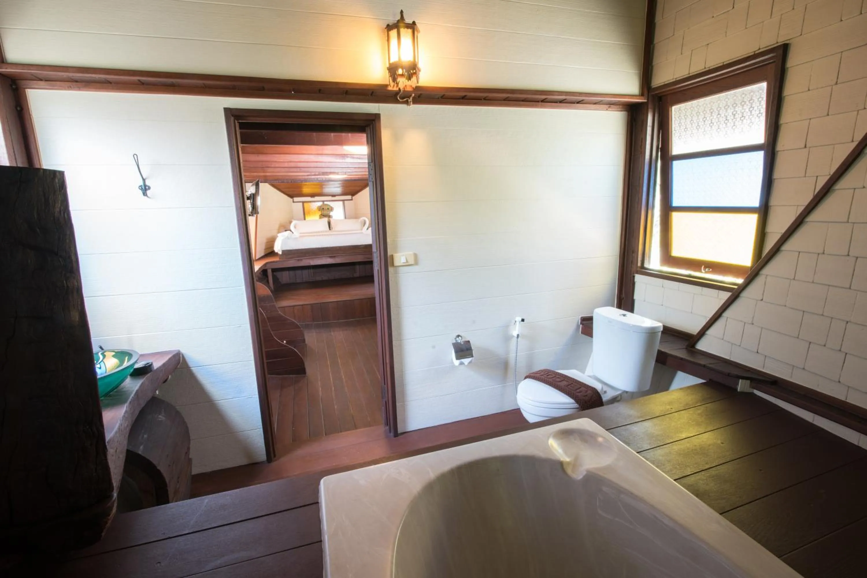 Bed in Suankaew Art Cottage