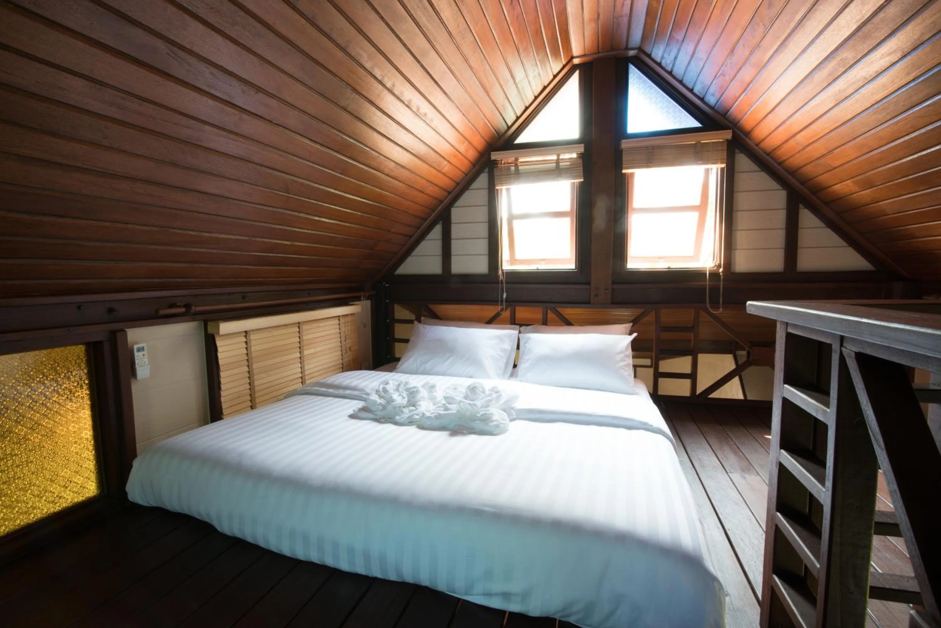 Bed in Suankaew Art Cottage