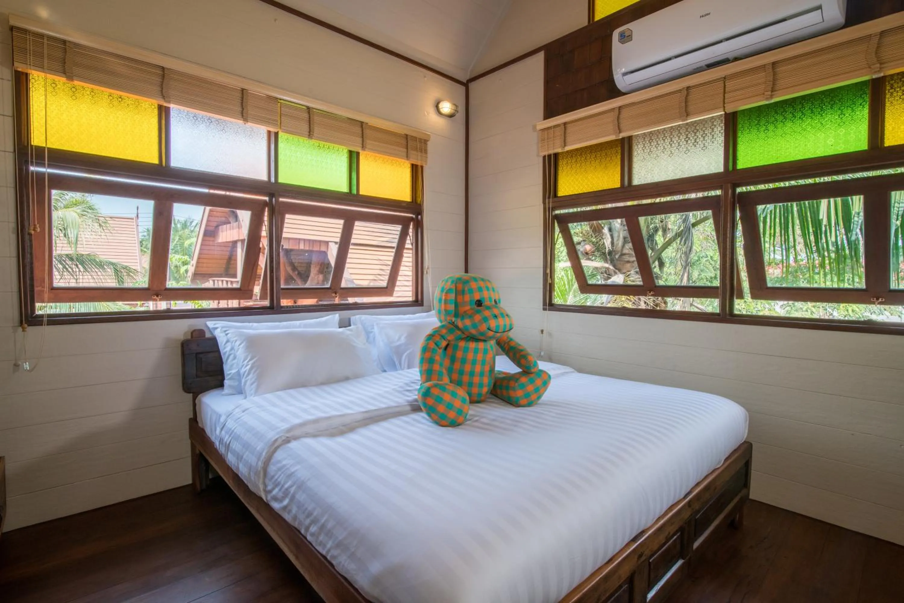 Bed in Suankaew Art Cottage