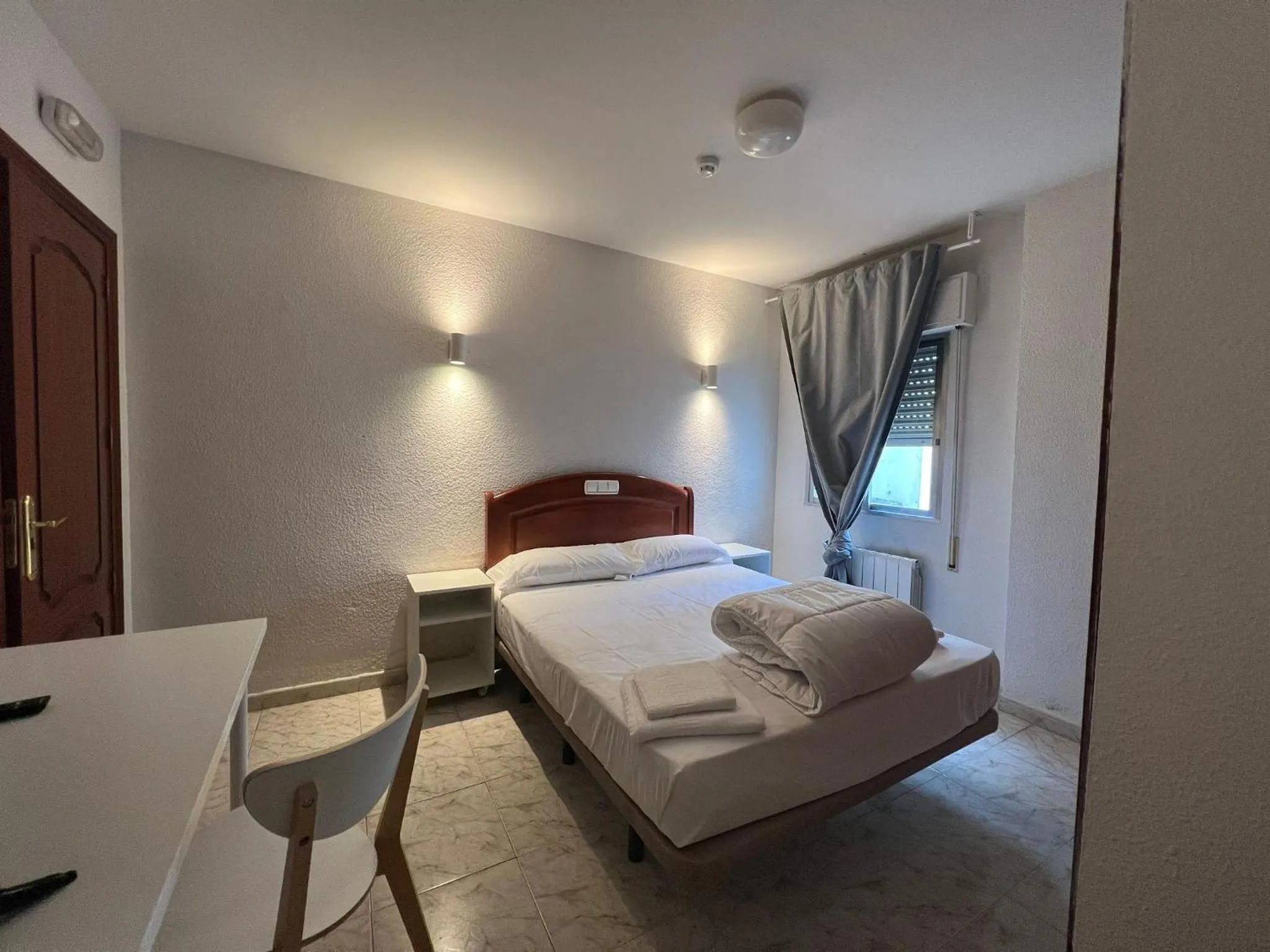 Bed in Hostal la Embajada